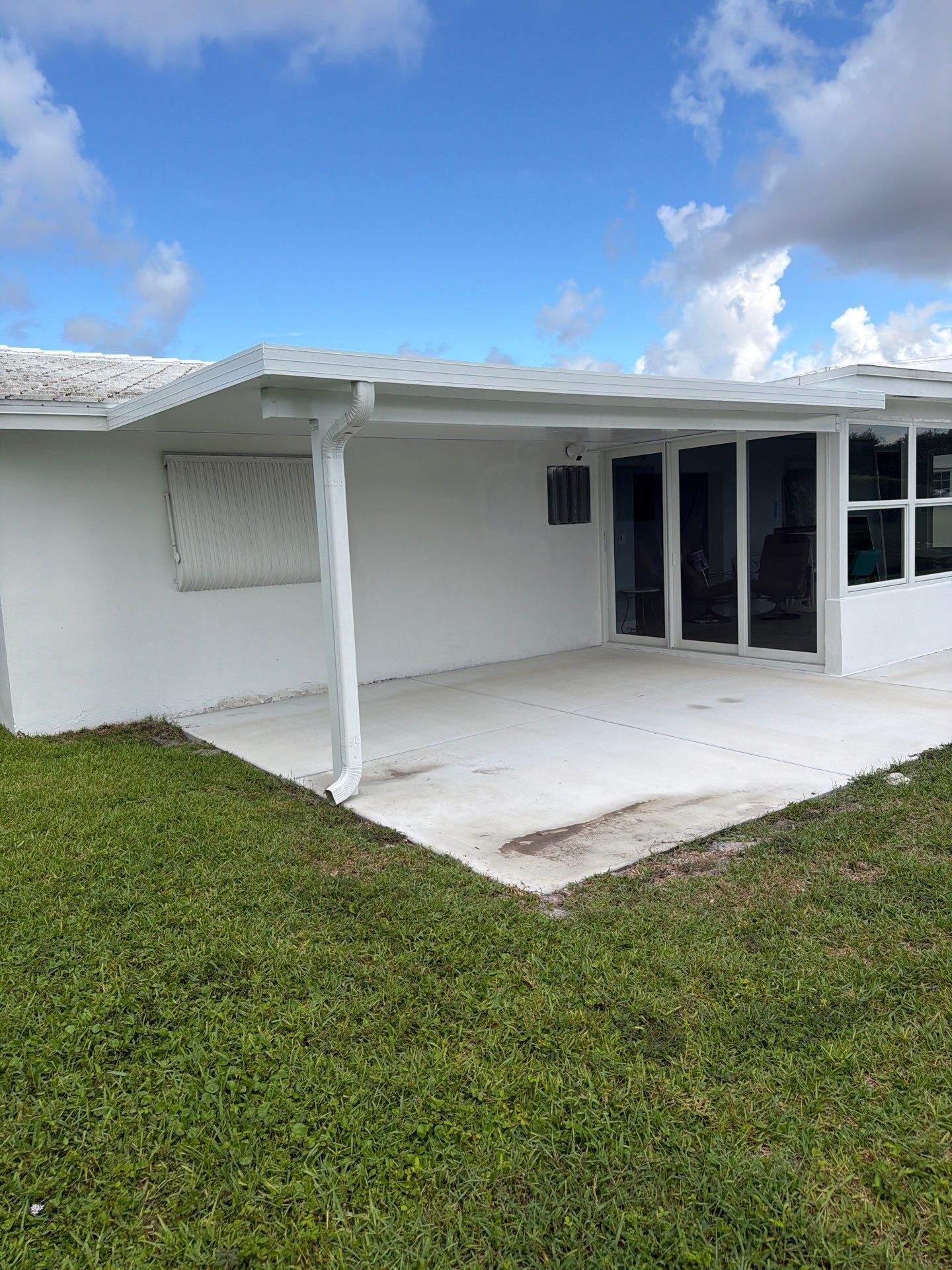 White Aluminum Insulated Roof Installation in Leisureville by The Screen Depot, Inc