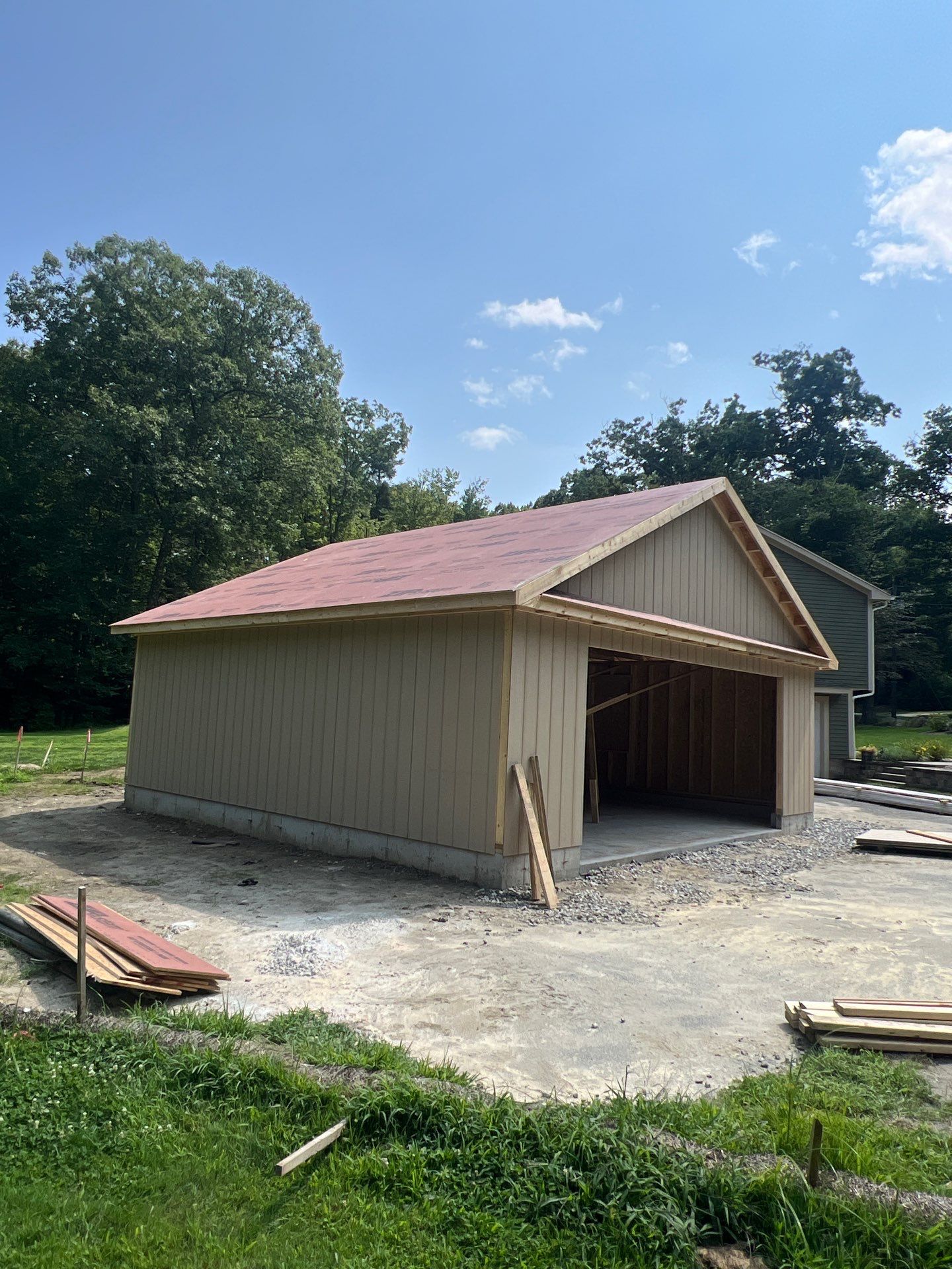 Two-Car Garage using LP SmartSide Panel Siding by Chagnon Building & Remodeling LLC
