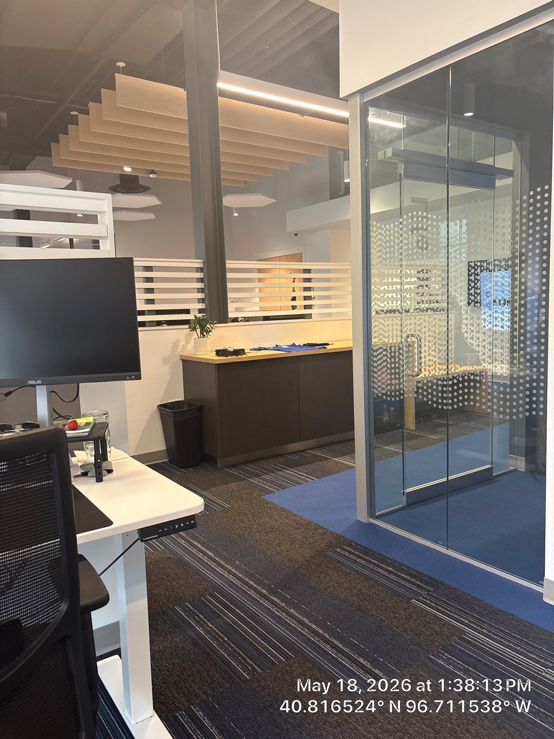 Modern Office Renovation in Lincoln Featuring Acoustic Ceilings and Glass Partitions by CompanyCam Sales Demo