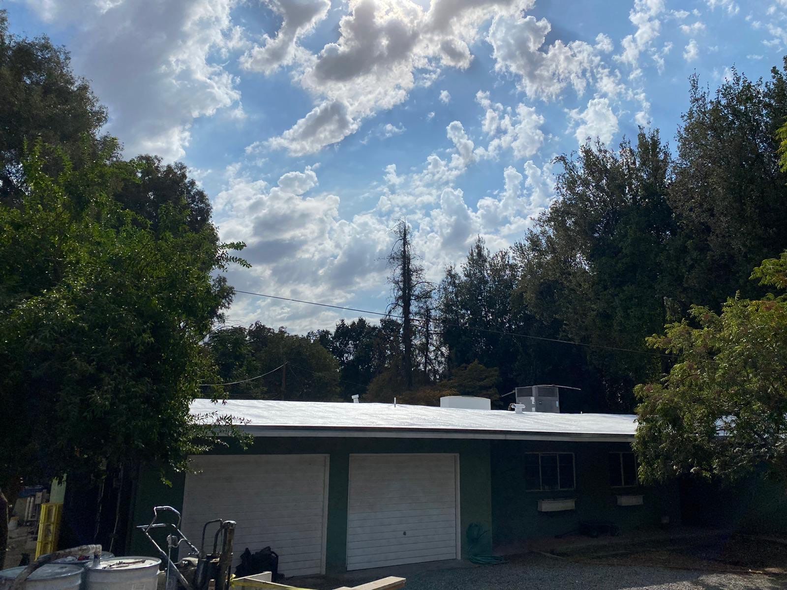 New spray insulation roof over tar and gravel with coatings by Straight Edge Roofing Inc