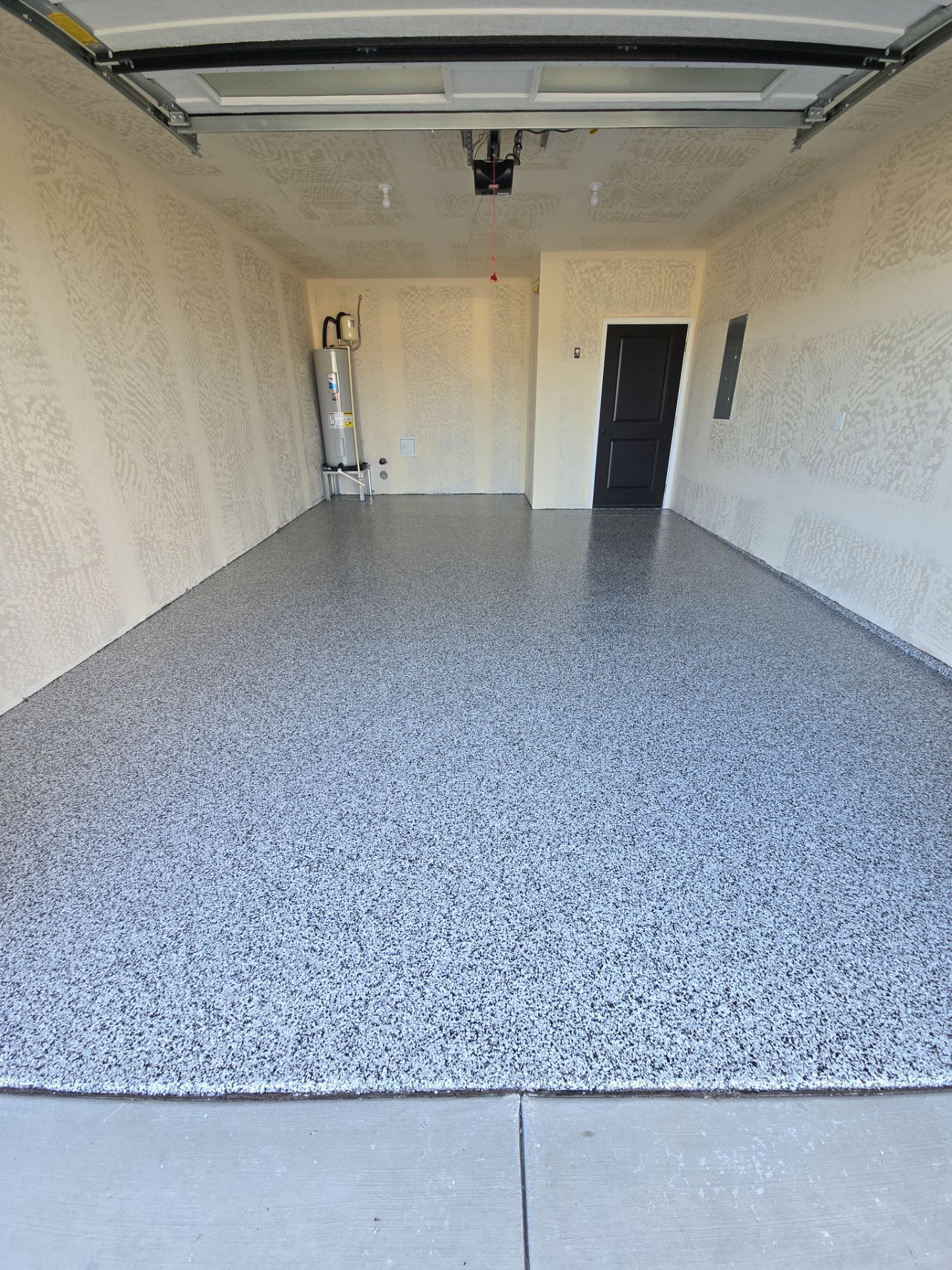 Domino 1/4-Inch Chip Garage Floor Coating in Coeur d'Alene by Croc Coatings, LLC