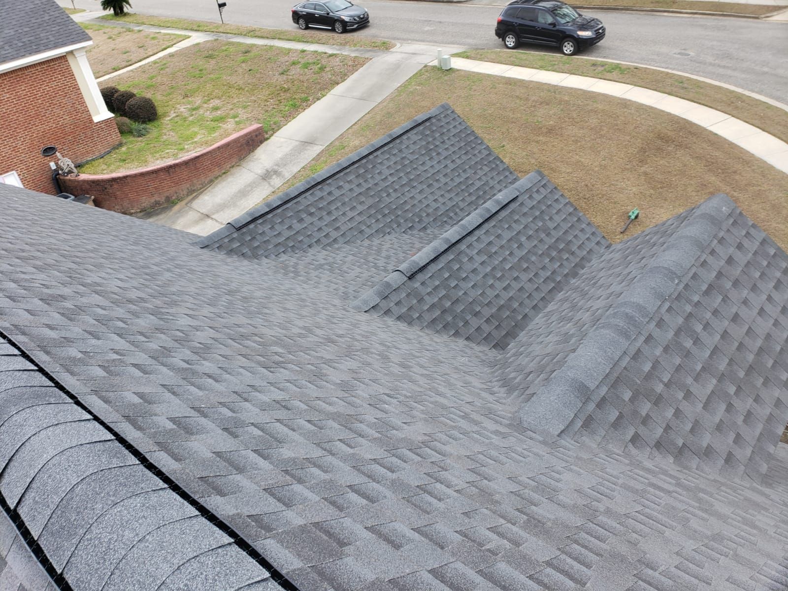 Residential Roofing Installation using Roof Replacement by American Roofing & Construction LLC