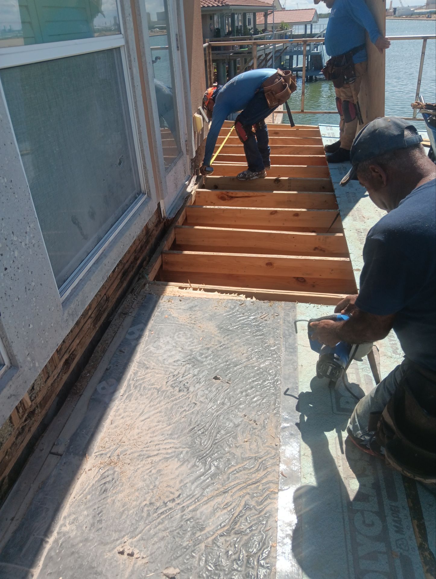 Walk Out Patio Cover by Bayfront Roofing and Construction