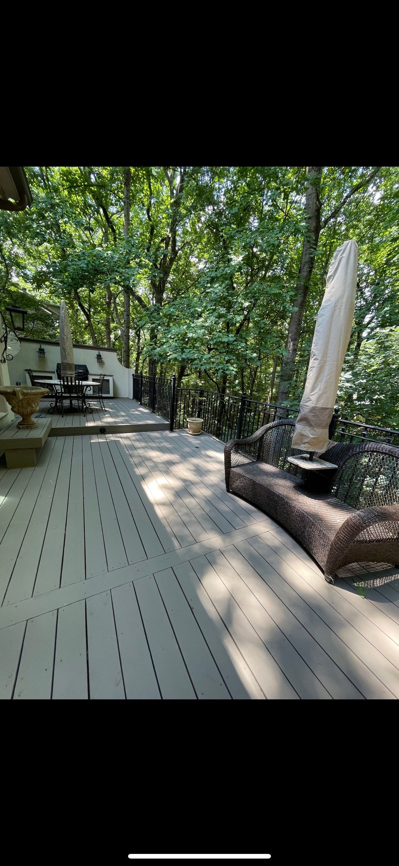 Custom Tiered Composite Deck and Covered Porch in Alpharetta by Swift Home Renovations