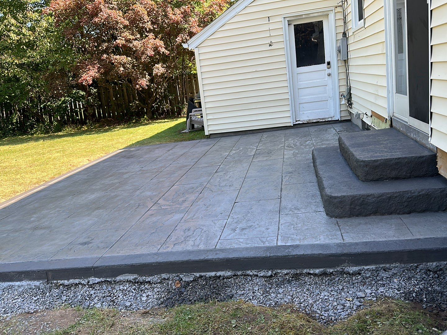 York Bluestone stamped patio by NG Masonry & Construction LLC