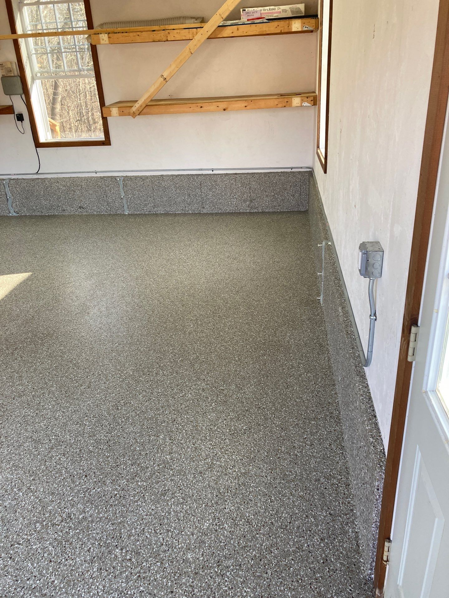 Garage in Nashua, NH 03063 by Symphony Concrete Coatings
