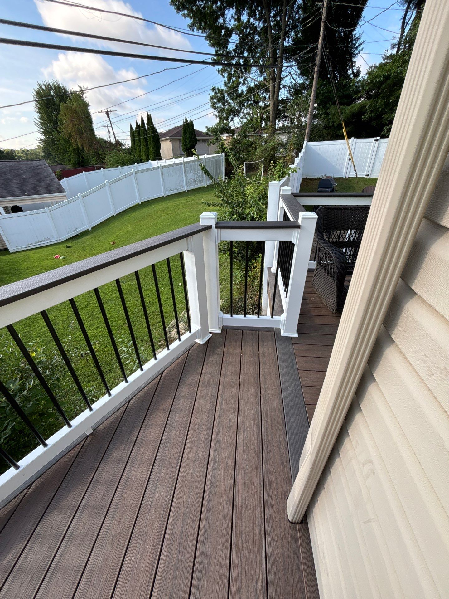 2 tone Composite Re-Deck with Vinyl Railings in Pittsburgh by Cousins Roofing Siding & Decks