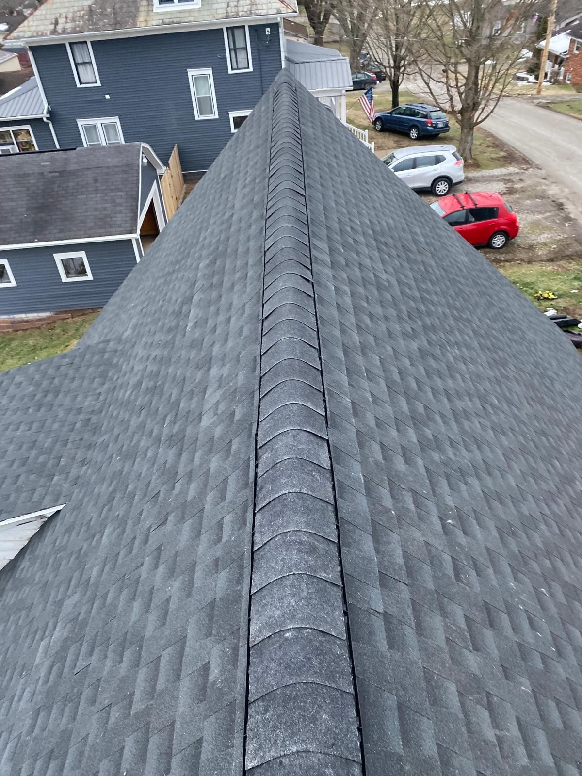Residential Roofing Installation using GAF Timberline HDZ Charcoal by Rainstoppers Roofing