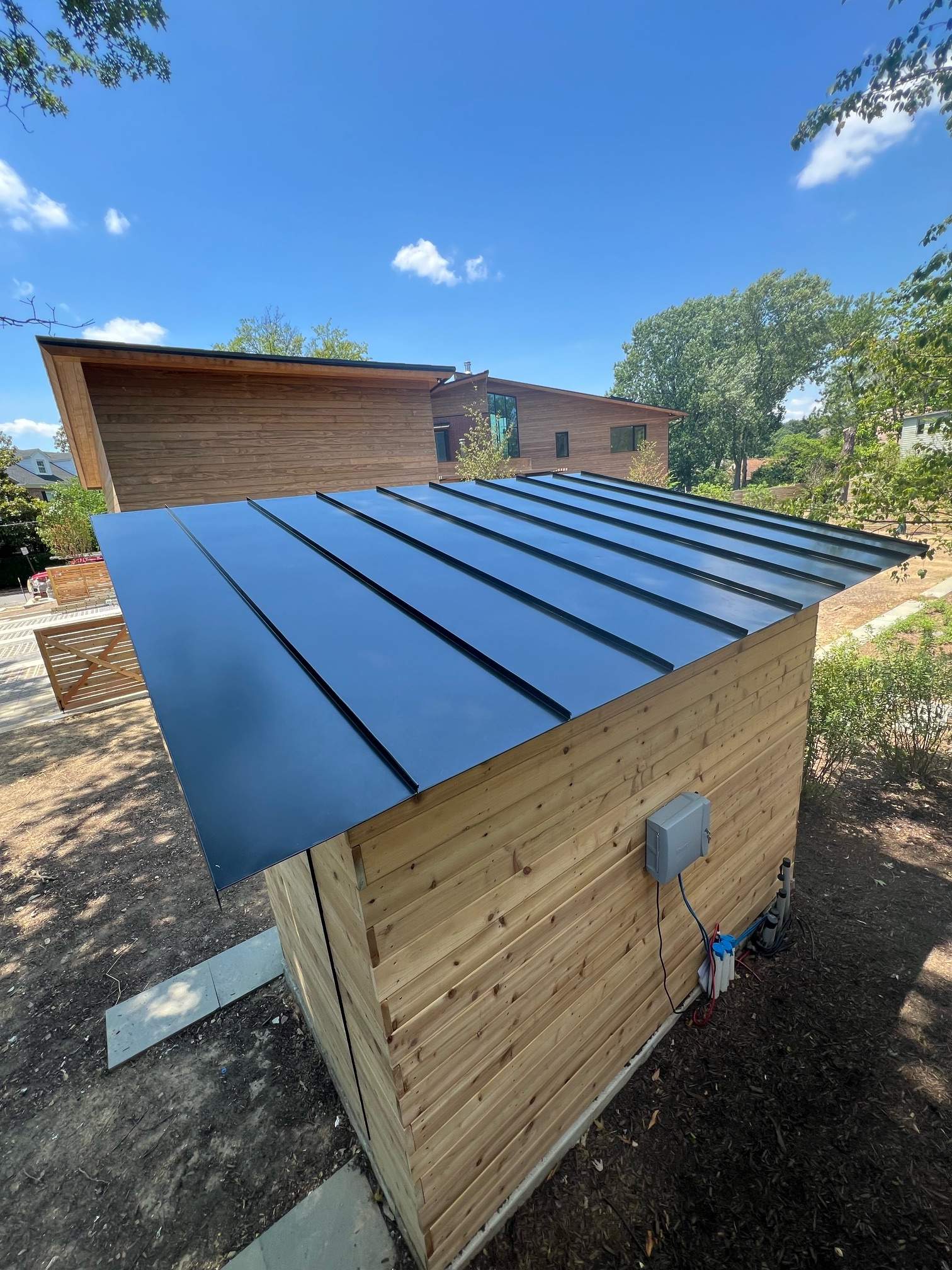 Tesla Solar Roof using SPAN smart electrical panel by American Home Contractors