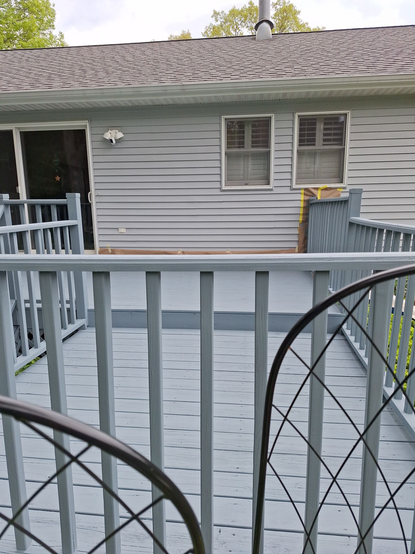 Repaint bedroom furniture, Pergola, and doors. Stain decking by Gordon Painting