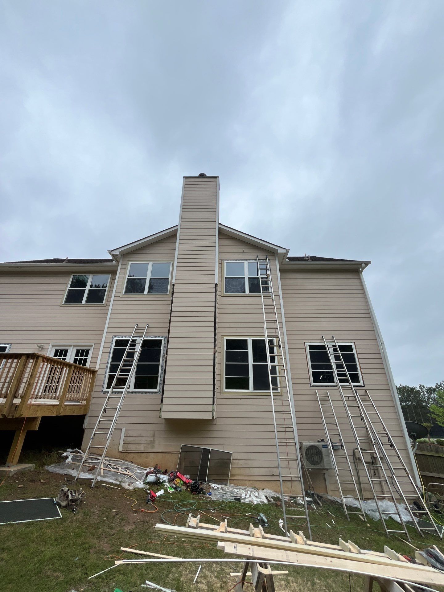 Window & Rotted Wood Replacement, Deck Stain, and Exterior Paint by Nelson Exteriors
