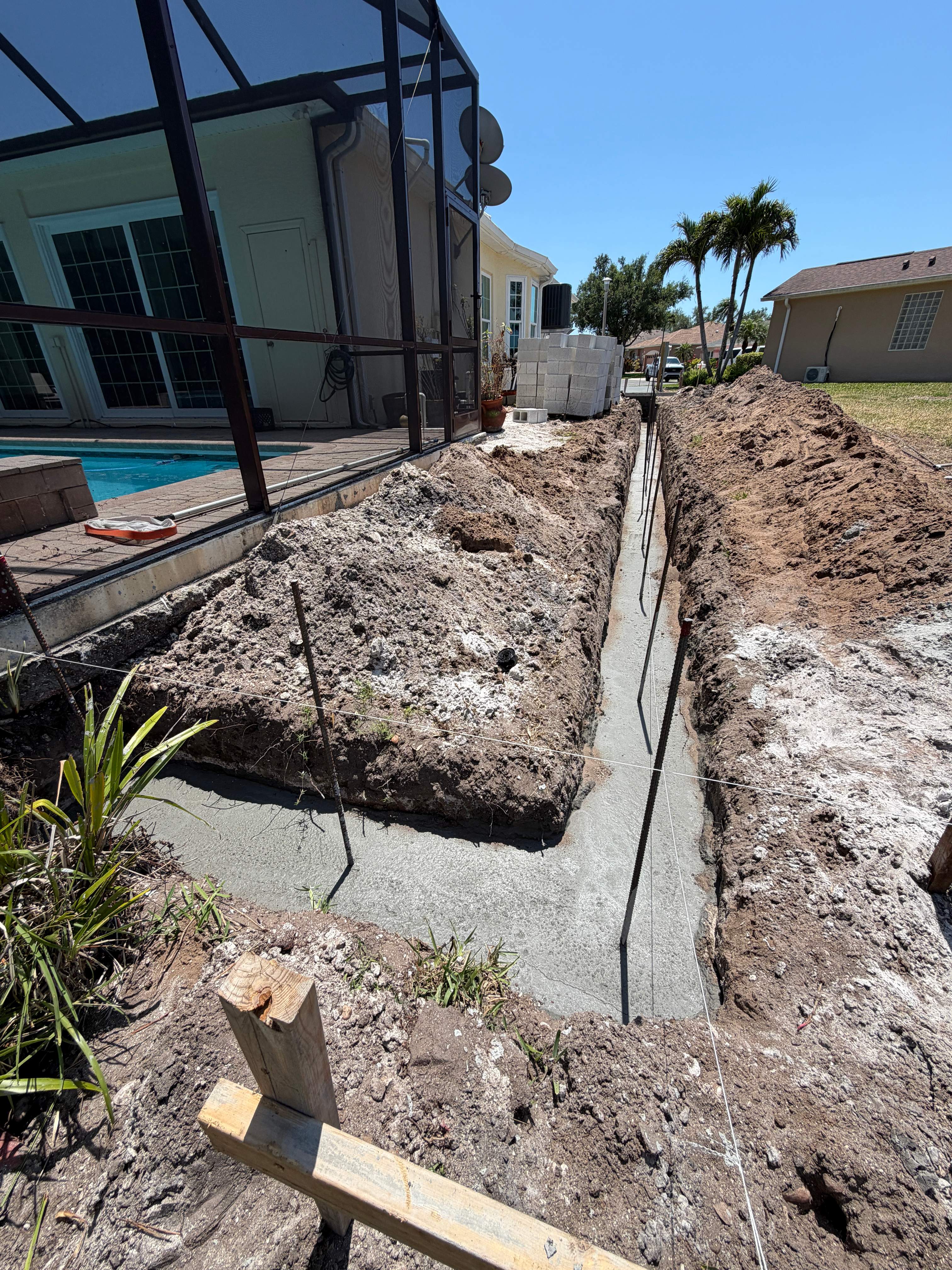 Custom Single-Car Garage Addition and Lanai Cage in Bradenton by Vertical General Contracting 