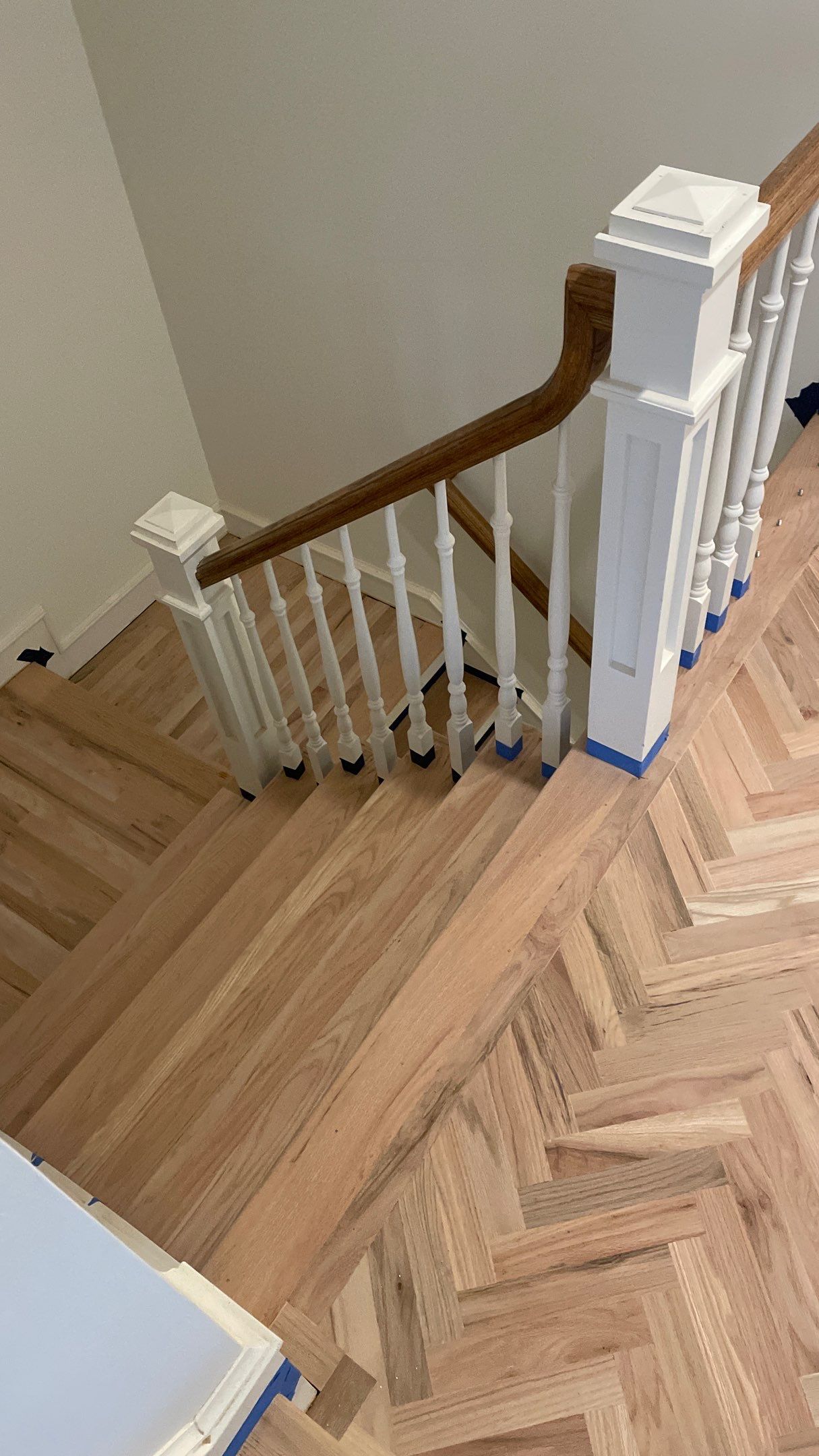 Herringbone Wood Hallway and Rooms by Footprints Floors of Coastal Carolina