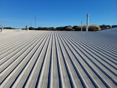 Wide view of standing seam metal roof panels