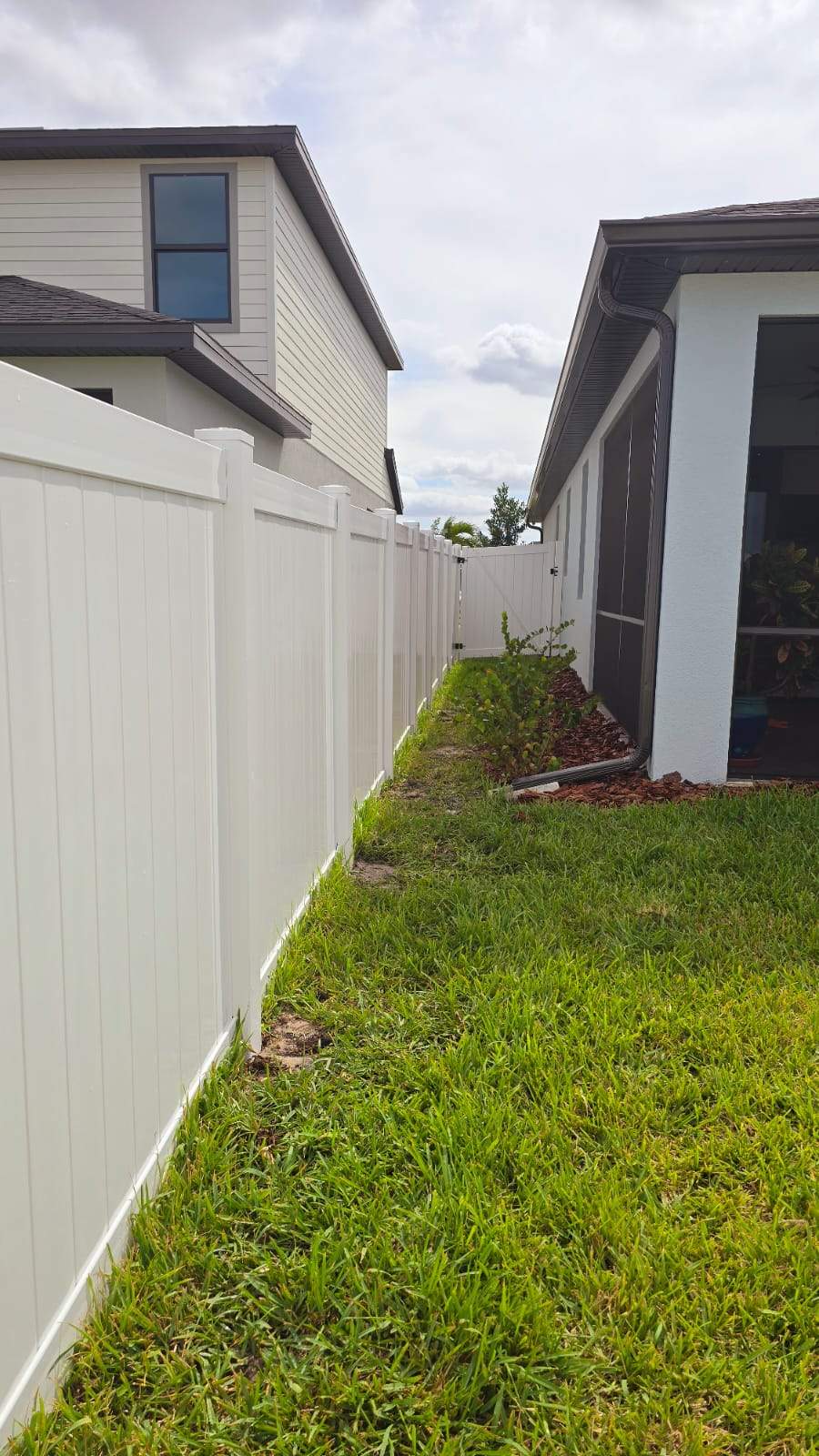 White Vinyl Privacy Fence Installation for North Port Residential Property by True Fence LLC