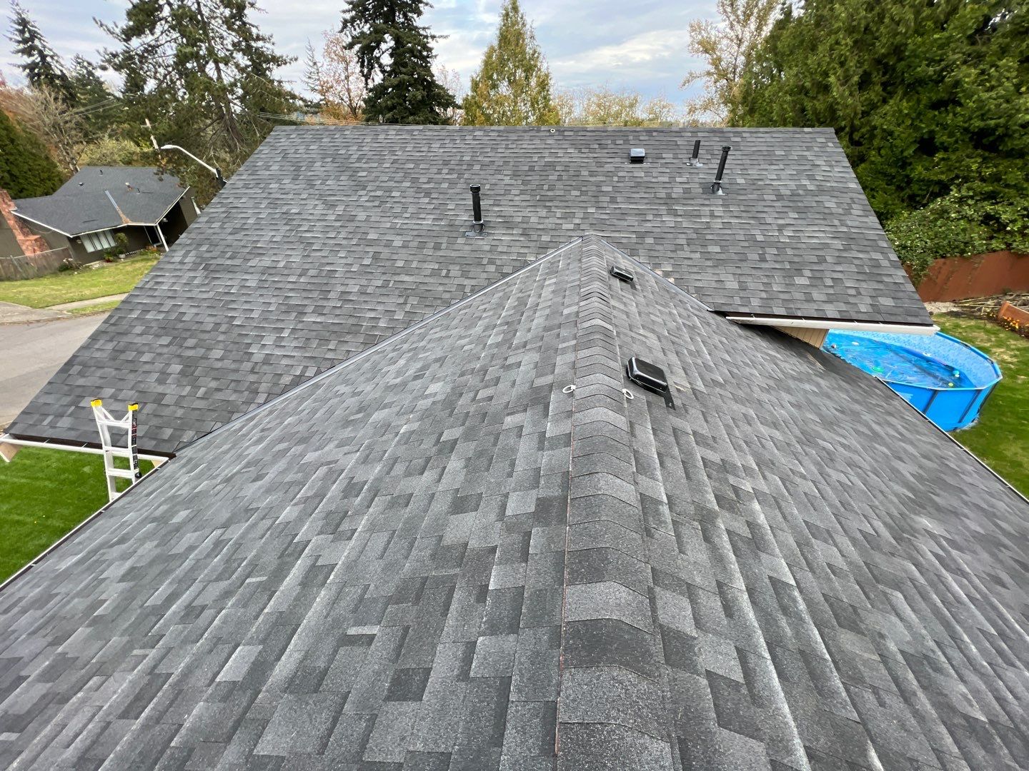 Estate Gray Shingles by Reimagine Roofing