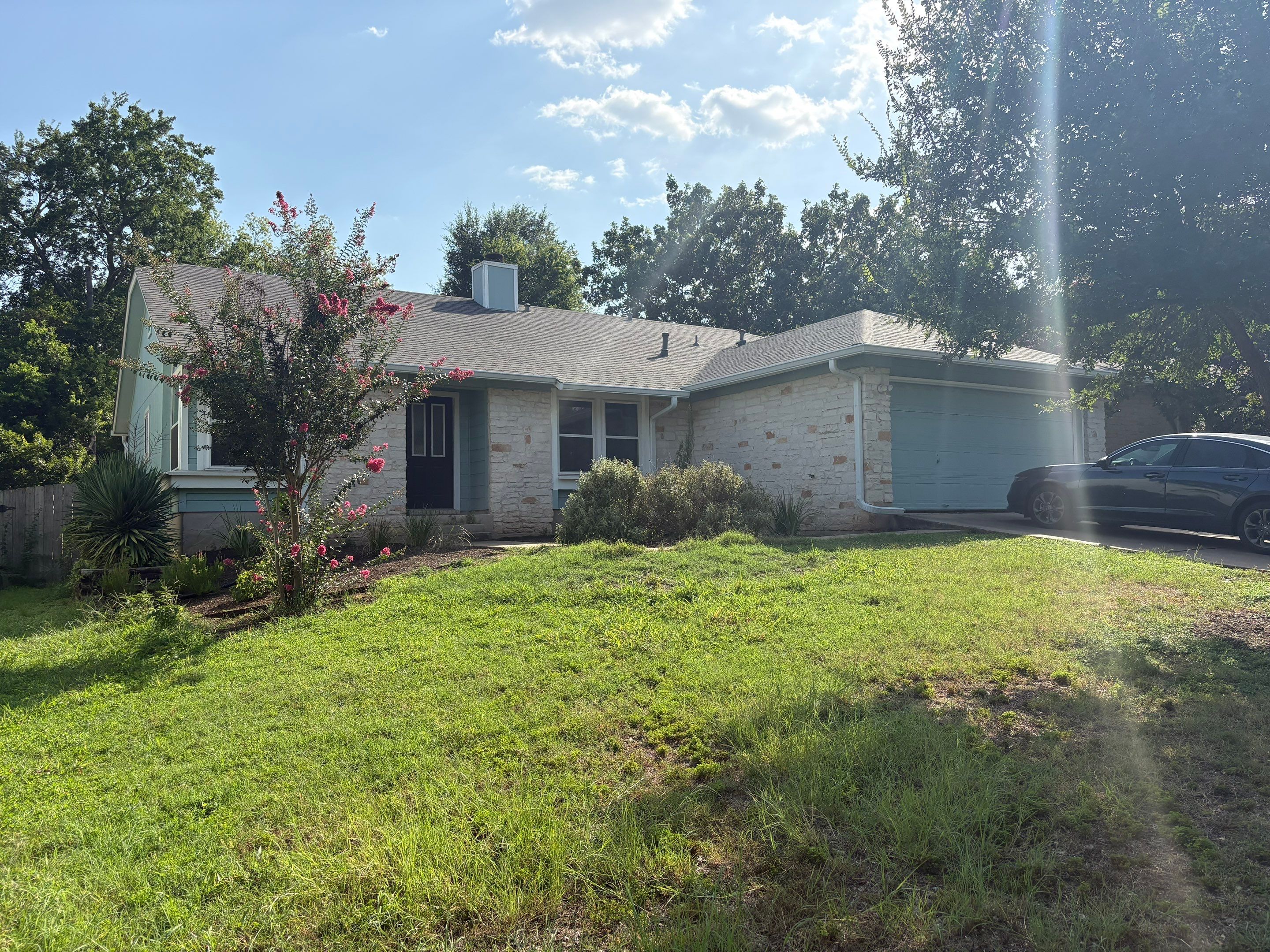 Chimney Siding Repair and New Cap Installation in Austin by DeZign Roofing & Exteriors