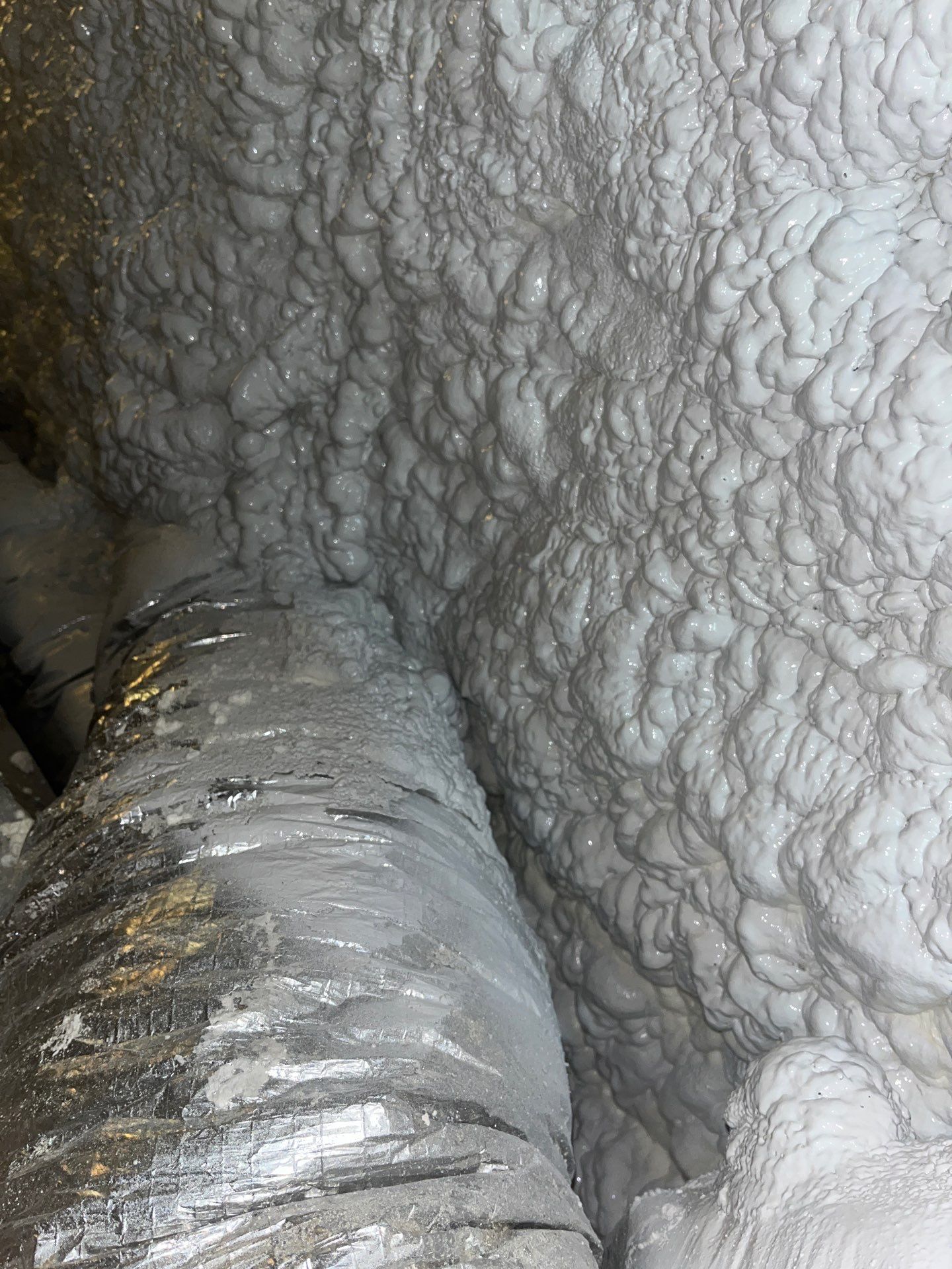 Attic Insulation using open cell spray foam by NYS Foam & Energy