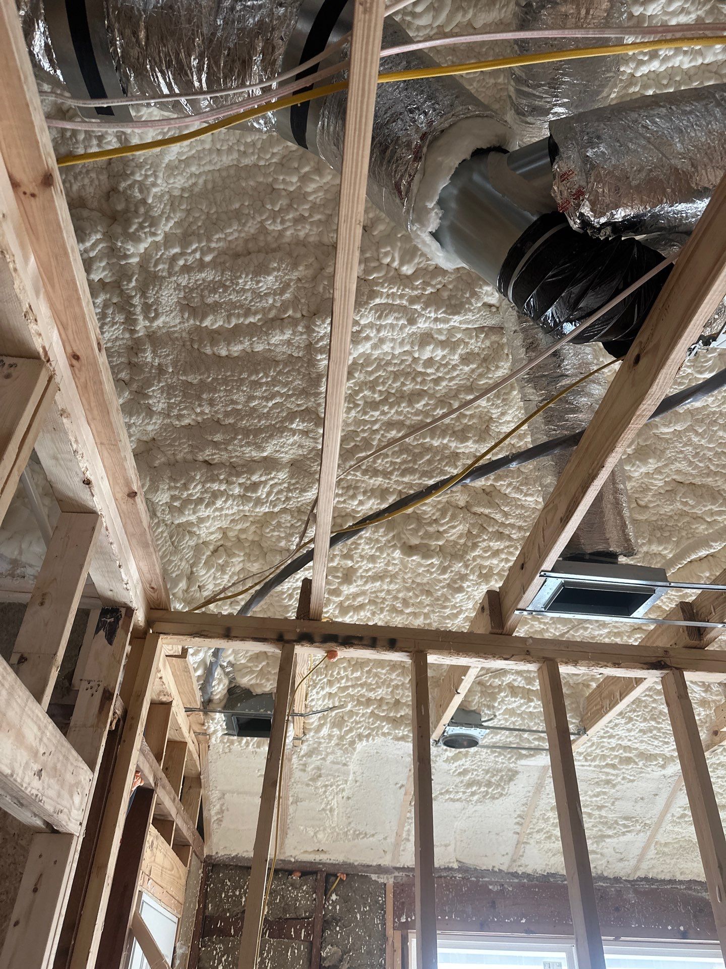 Open cell spray foam & rockwool job completed in Dallas TX by Apex Insulation Solutions