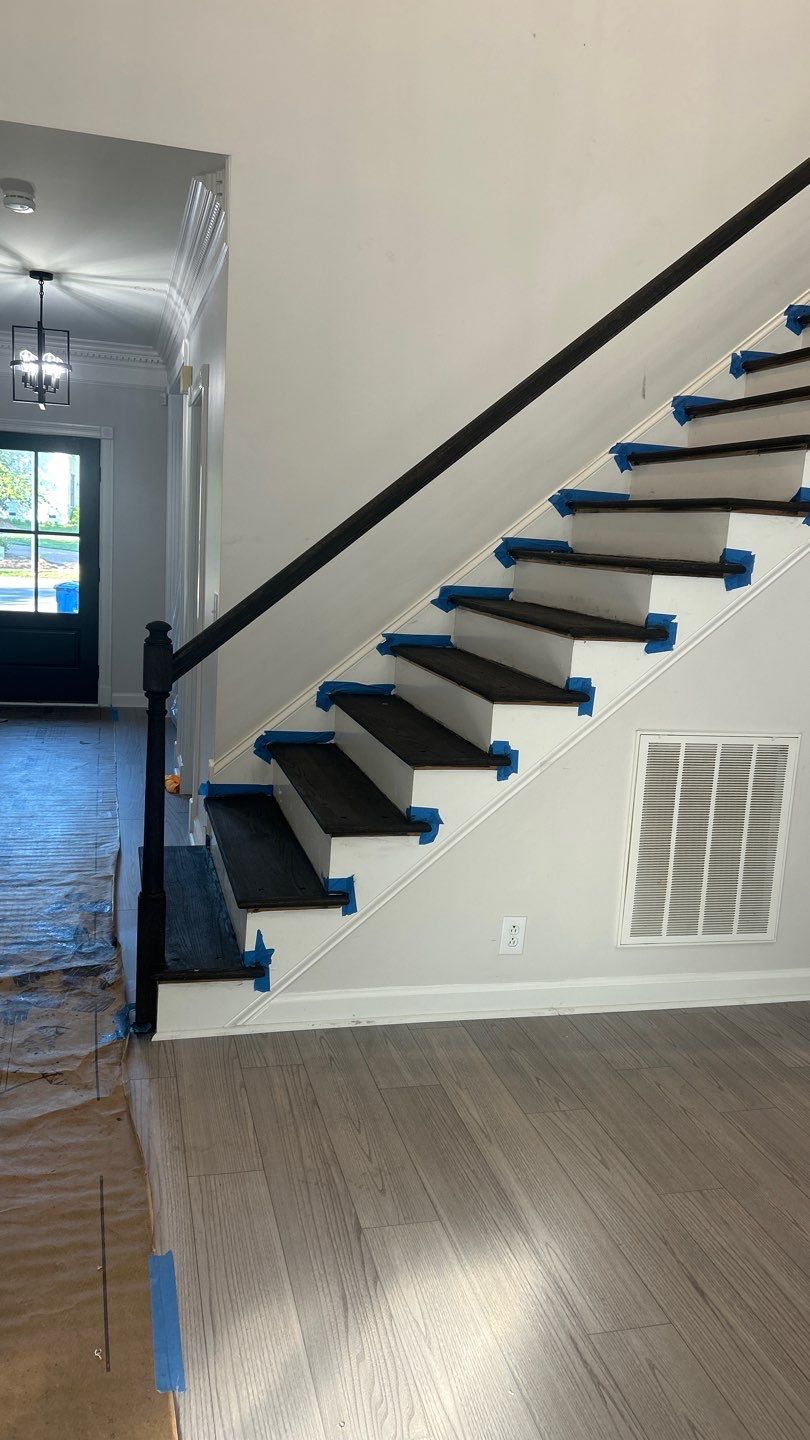 Updated staircase and hallway by Footprints Floors of Nashville