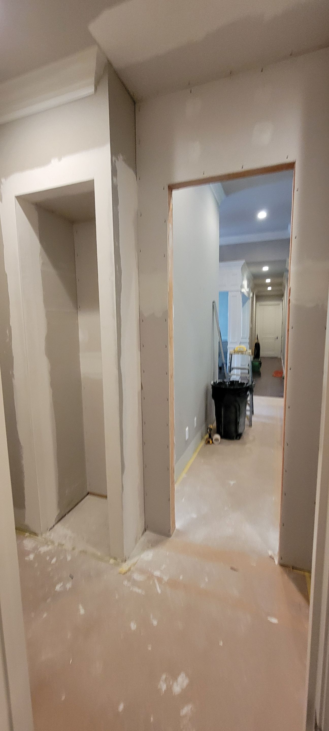 Closet transformation to coffee nook with custom shelves and LED lighting. by Crm Services Llc