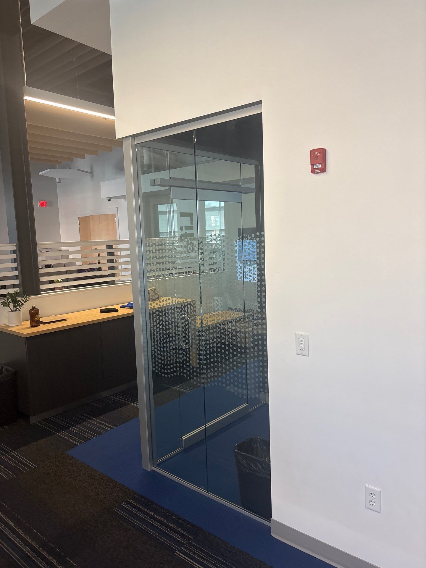 Lincoln Office Interior Remodel with Acoustic Baffles and Glass Walls by CompanyCam Sales Demo