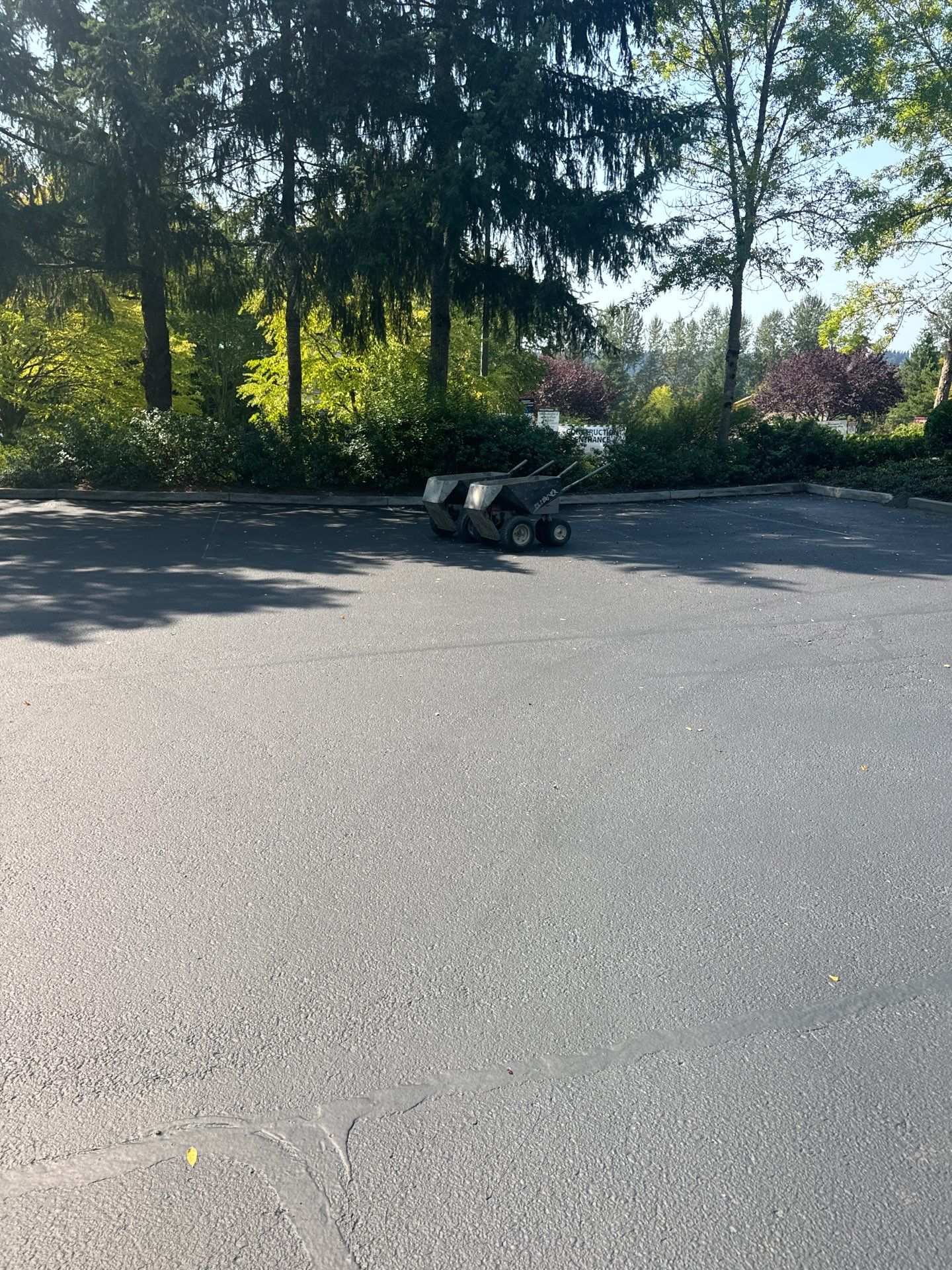 Kidder Matthews | Parking Lot Sealcoating & Striping with Concrete Curb & Patch Repairs  by Jireh Asphalt & Concrete Inc 