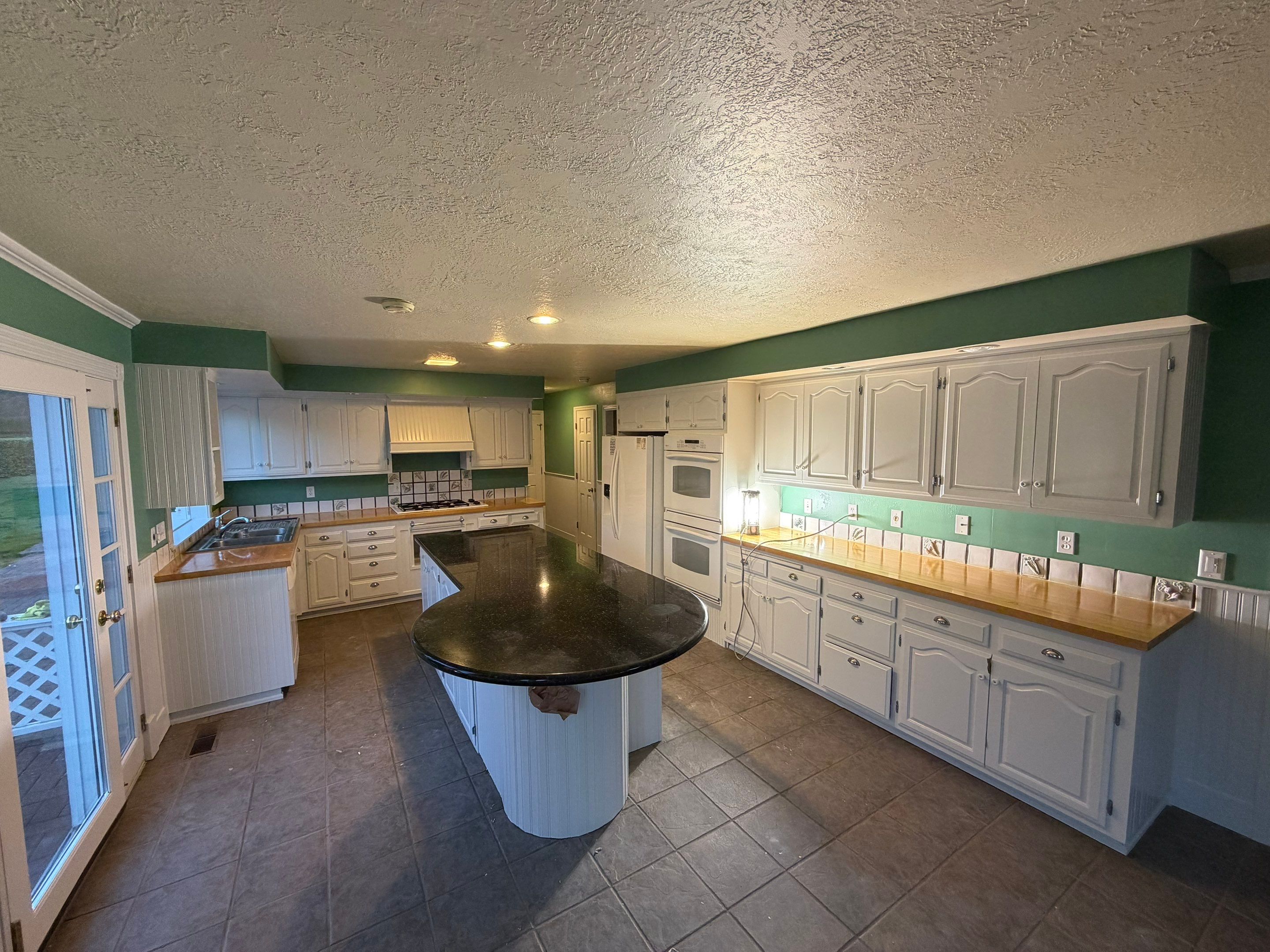 Kitchen Cabinets Painting by Handyman State LLC