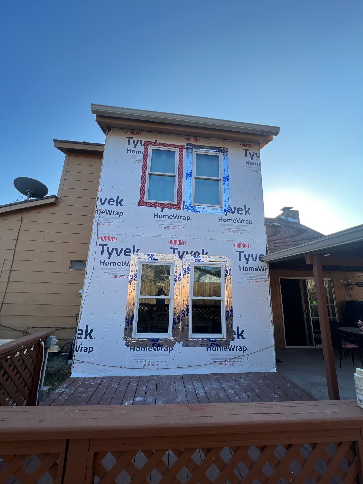 Installing Windows on a Submarine  by Bayfront Roofing and Construction