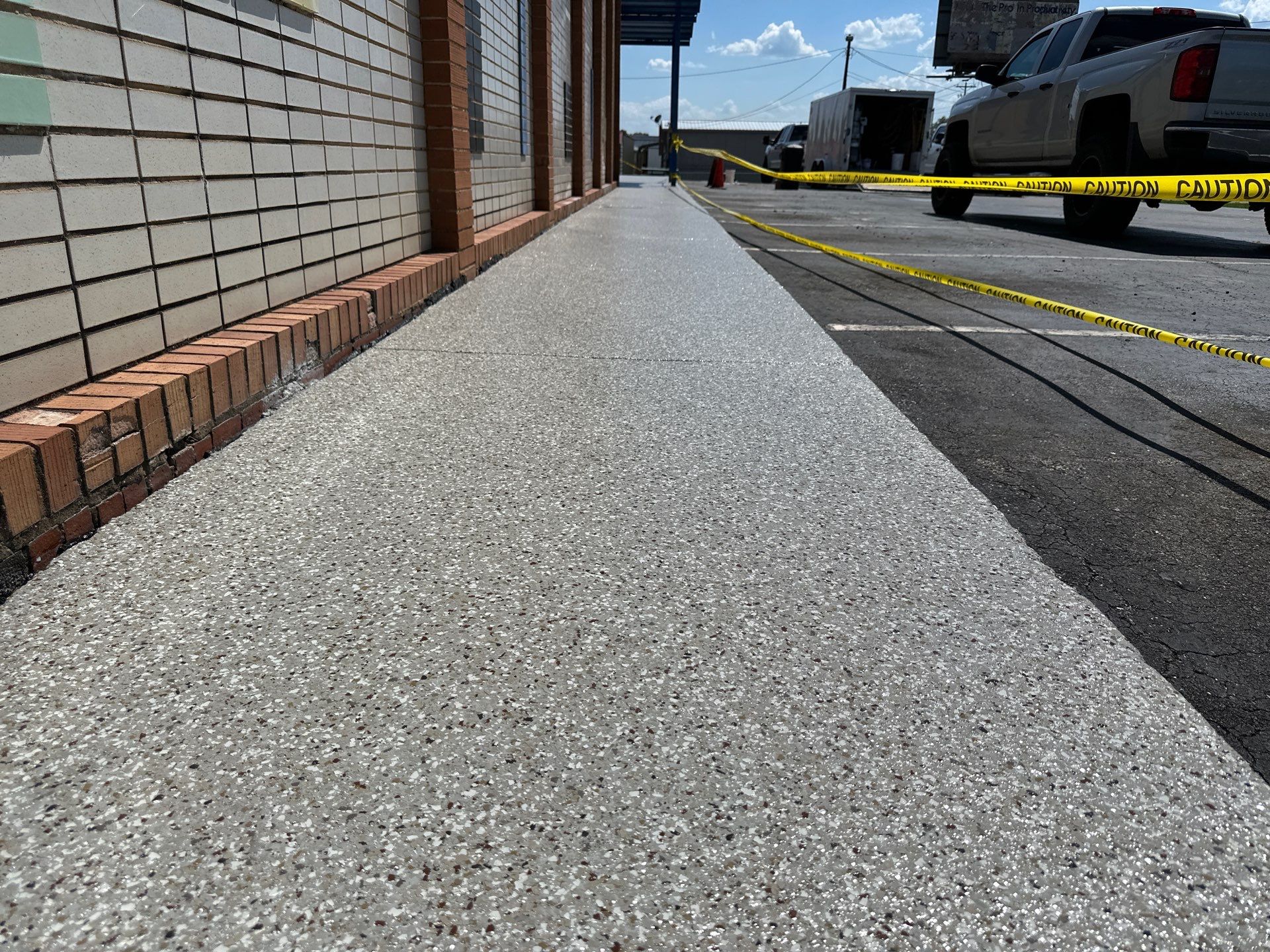 Sidewalk using Creekbed by Elite Floor Solutions