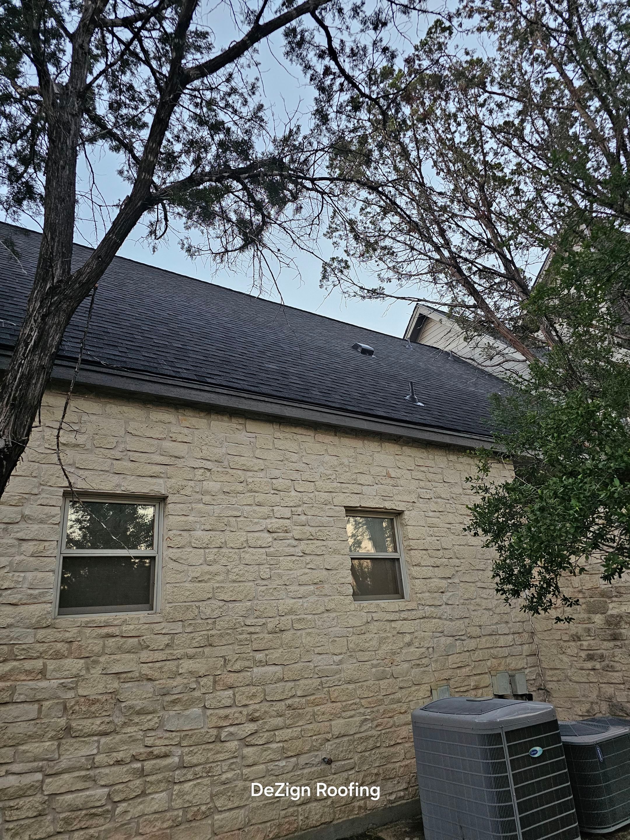 Residential Roofing Installation using IKO Nordic Granite Black by DeZign Roofing & Exteriors