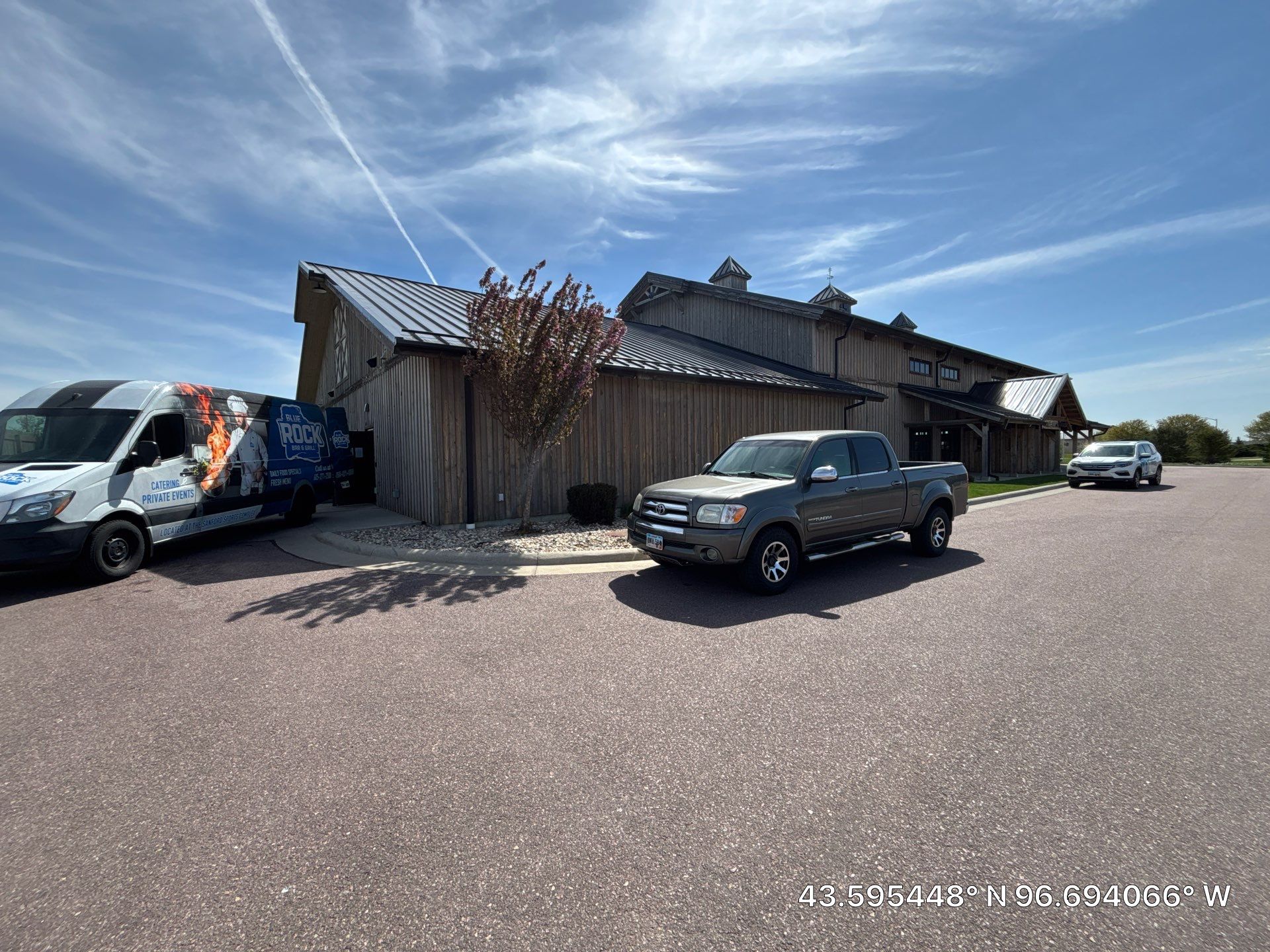Commercial Exterior Wood Staining for Sanford Barn in Sioux Falls by Select Painting, Coatings & Garage Cabinets