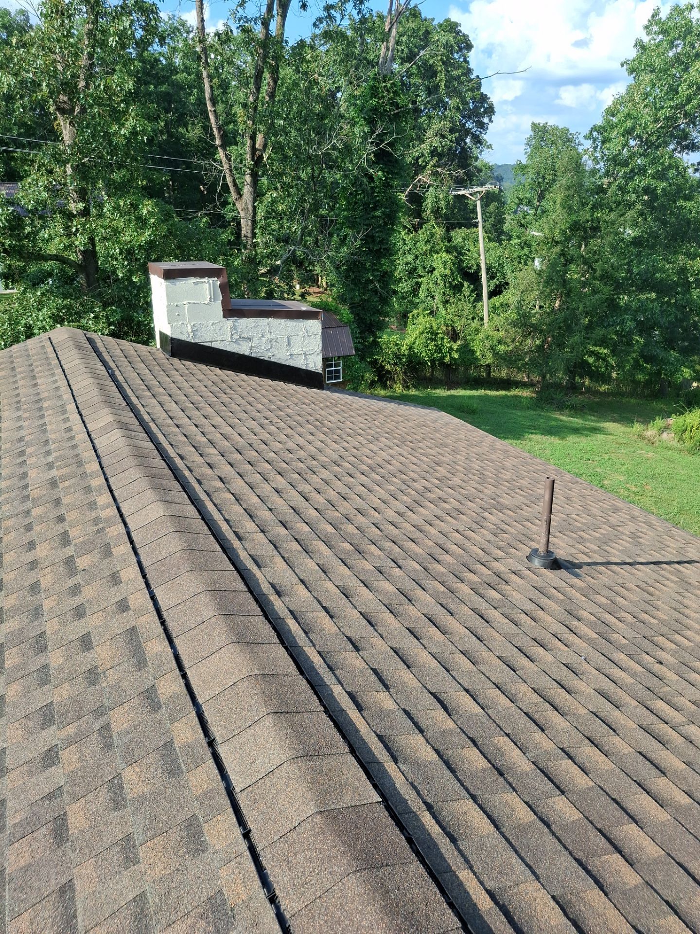 Residential Roofing Installation using GAF Timberline HDZ Barkwood by Rainstoppers Roofing