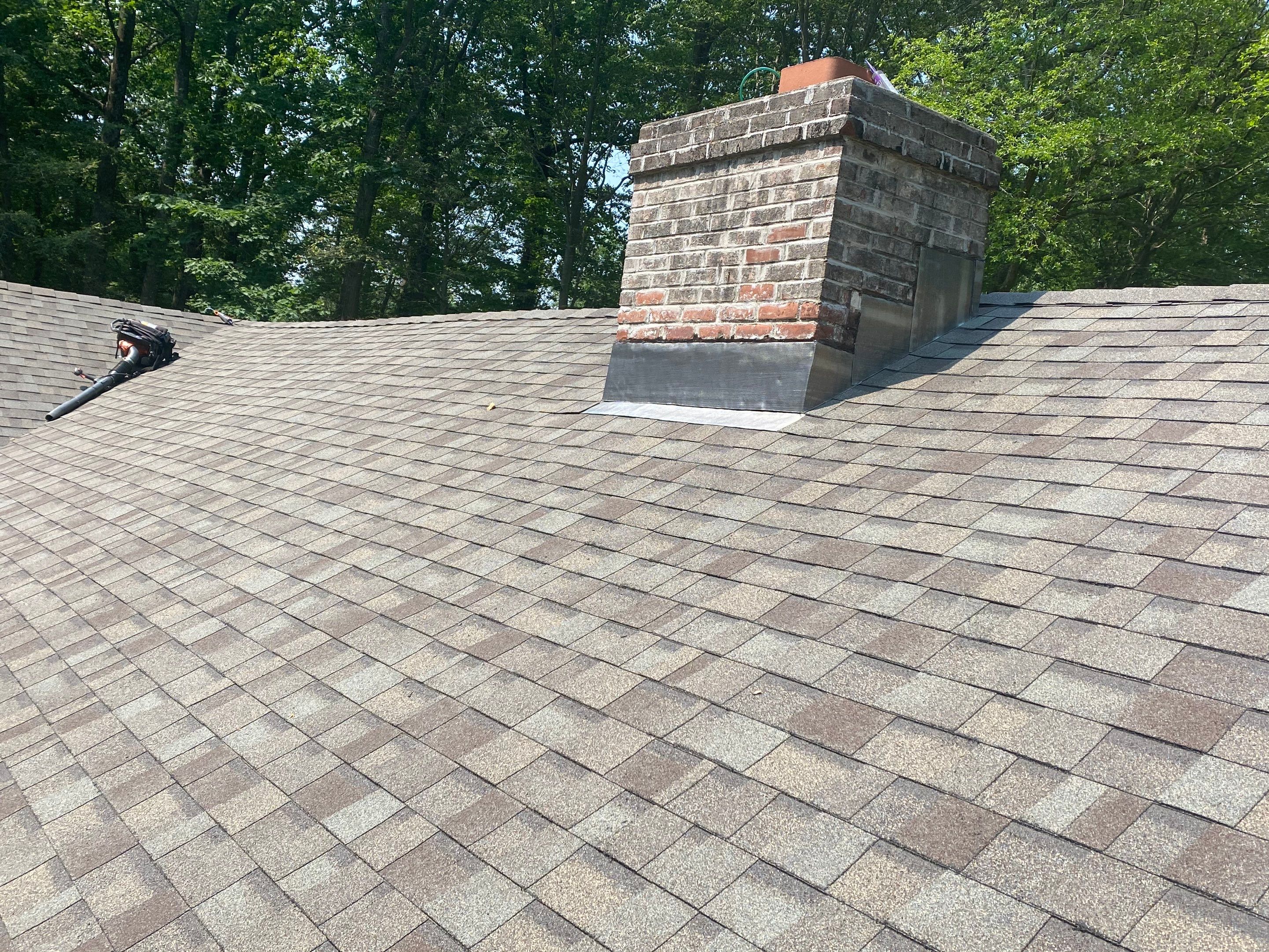 Commercial Roofing Installation using Owens Corning Duration Driftwood by A Plus Exterior