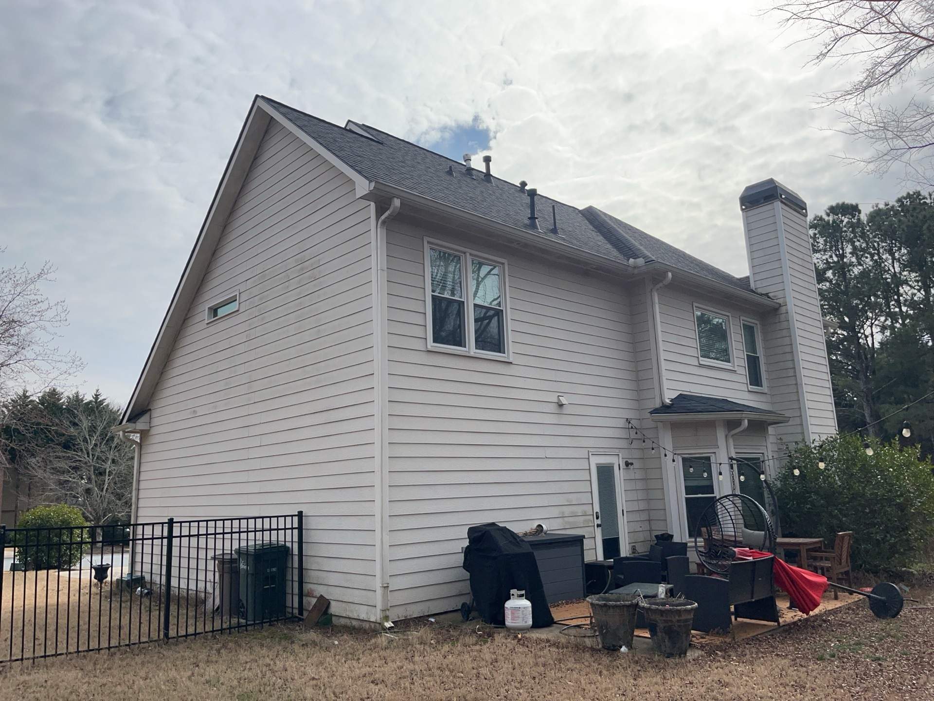 Marietta, GA Chimney Siding, Fascia, and Soffit Replacement using James Hardie Lap Siding, Hardie Trim, and Hardie Panel by Nelson Exteriors 