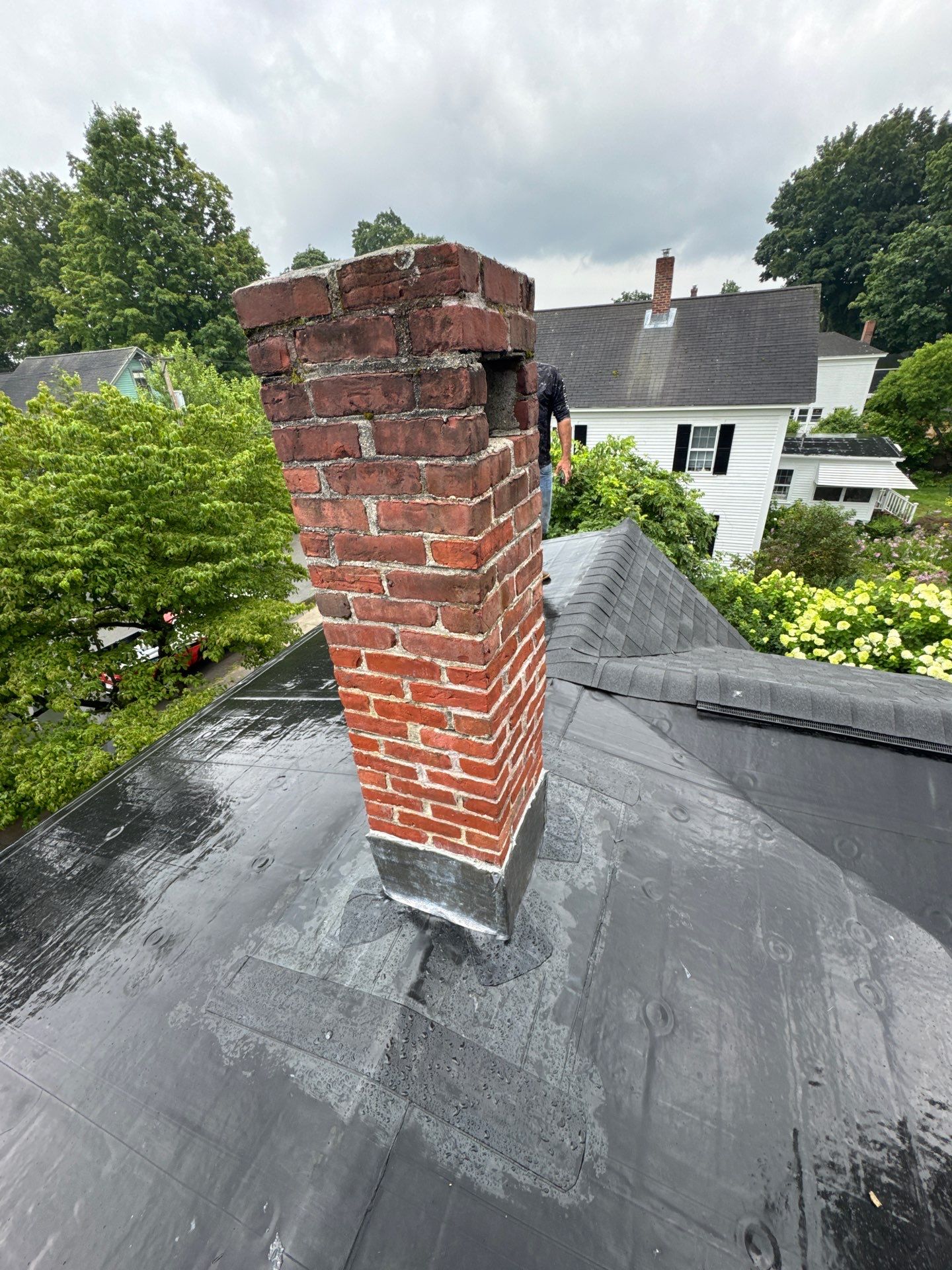 Full Roof Replacement + Custom Gutter Install | Onyx Black Finish by Mighty Dog Roofing of Greater Middlesex County