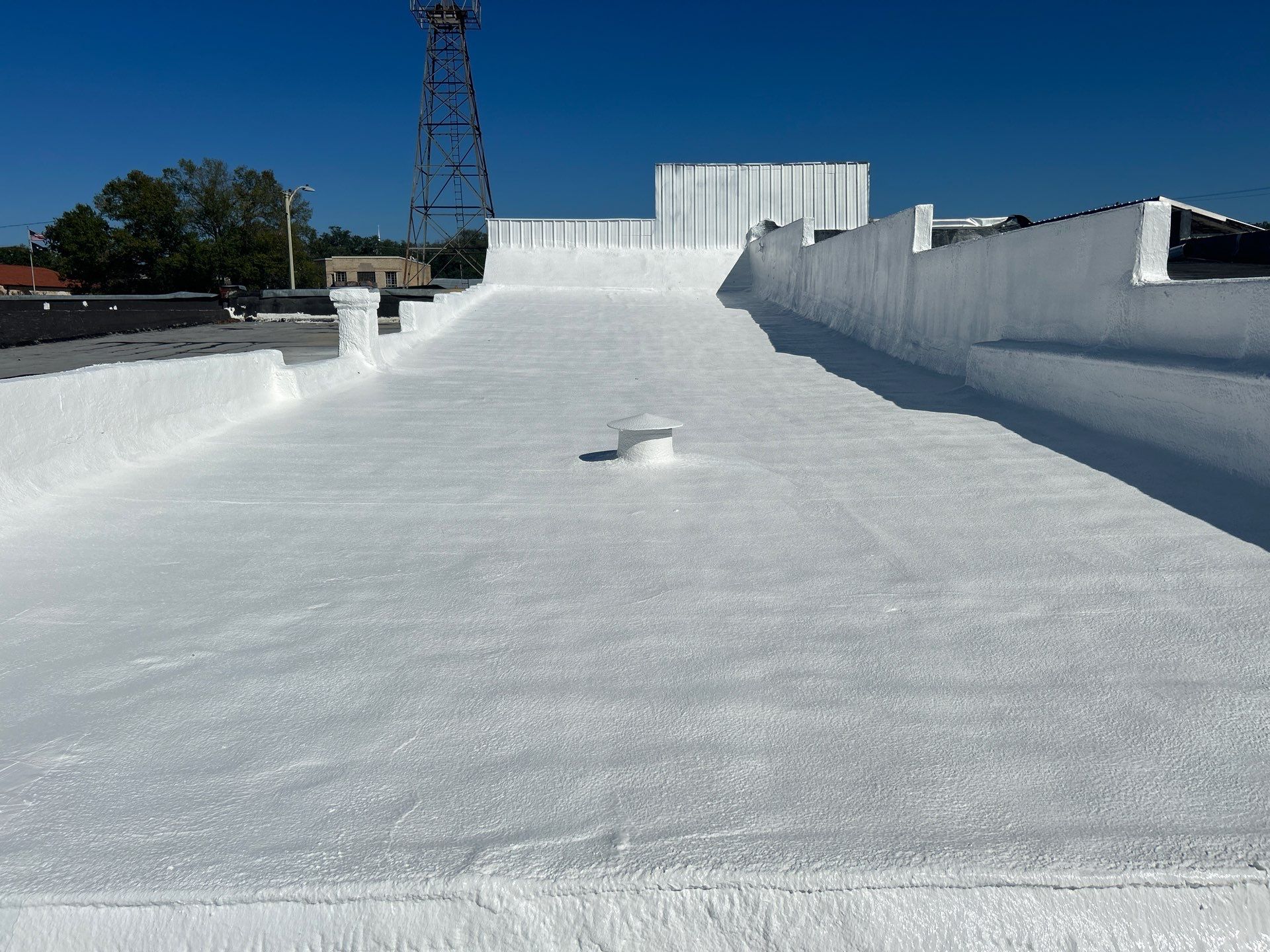 Downtown Gladewater Commercial Foam Roof Restoration – SPF + High-Tensile Acrylic by All Star Roofing LLC