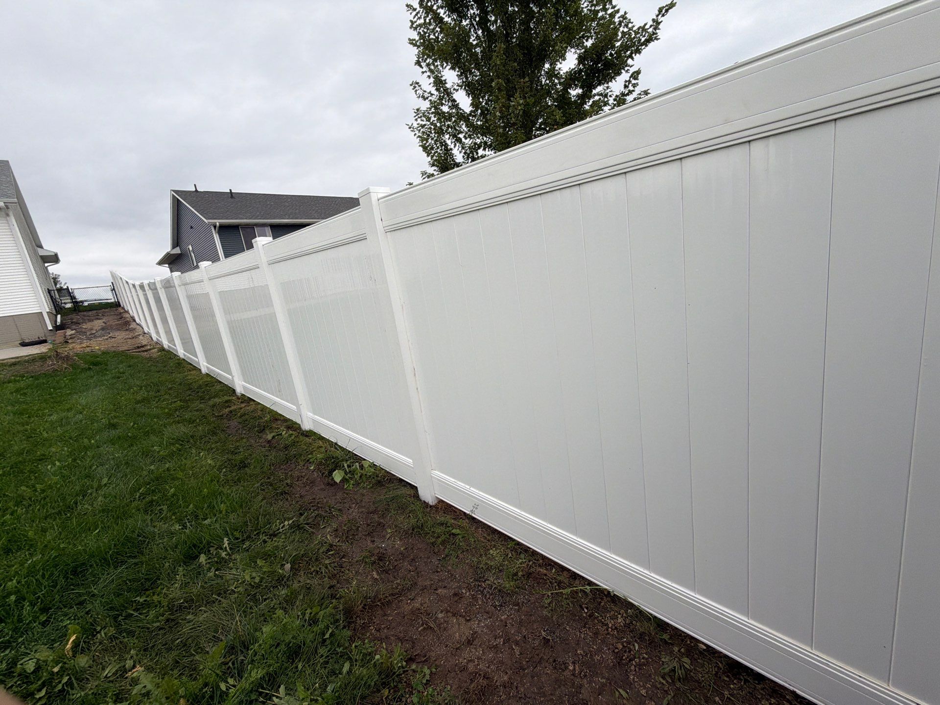 Residential Vinyl Privacy Fence Installation in Urbana by Perfect Picket Fence and Stain