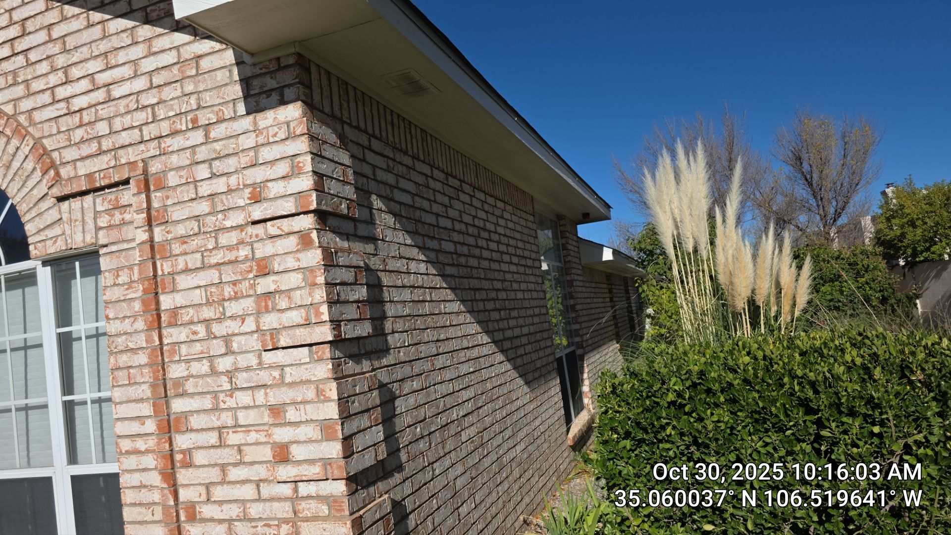 Seamless White Gutter and Downspout Installation in Albuquerque by Doyle Roof Masters Inc