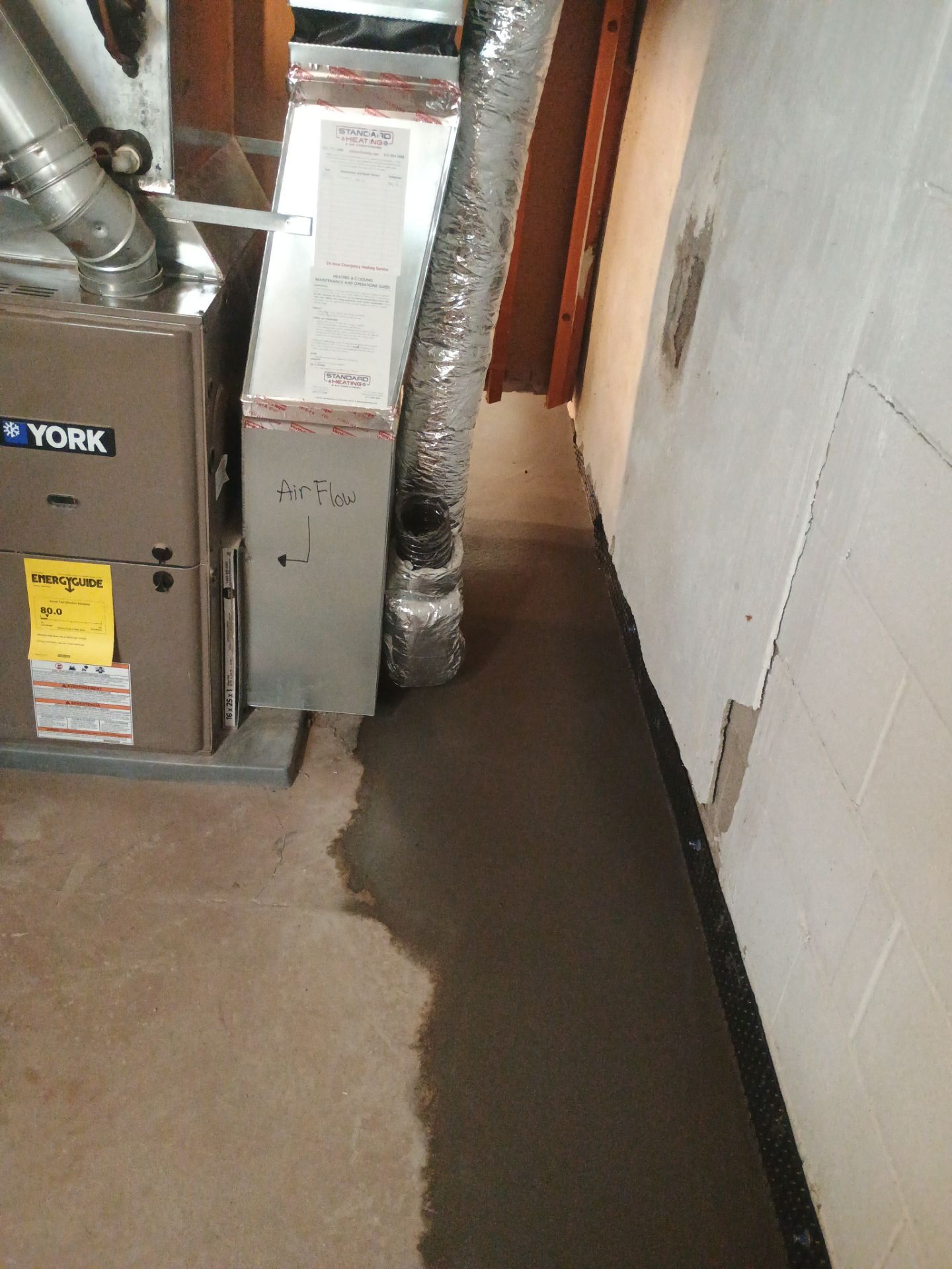 Interior Drain Tile Installation in South Minneapolis by Waterproofing Northeast
