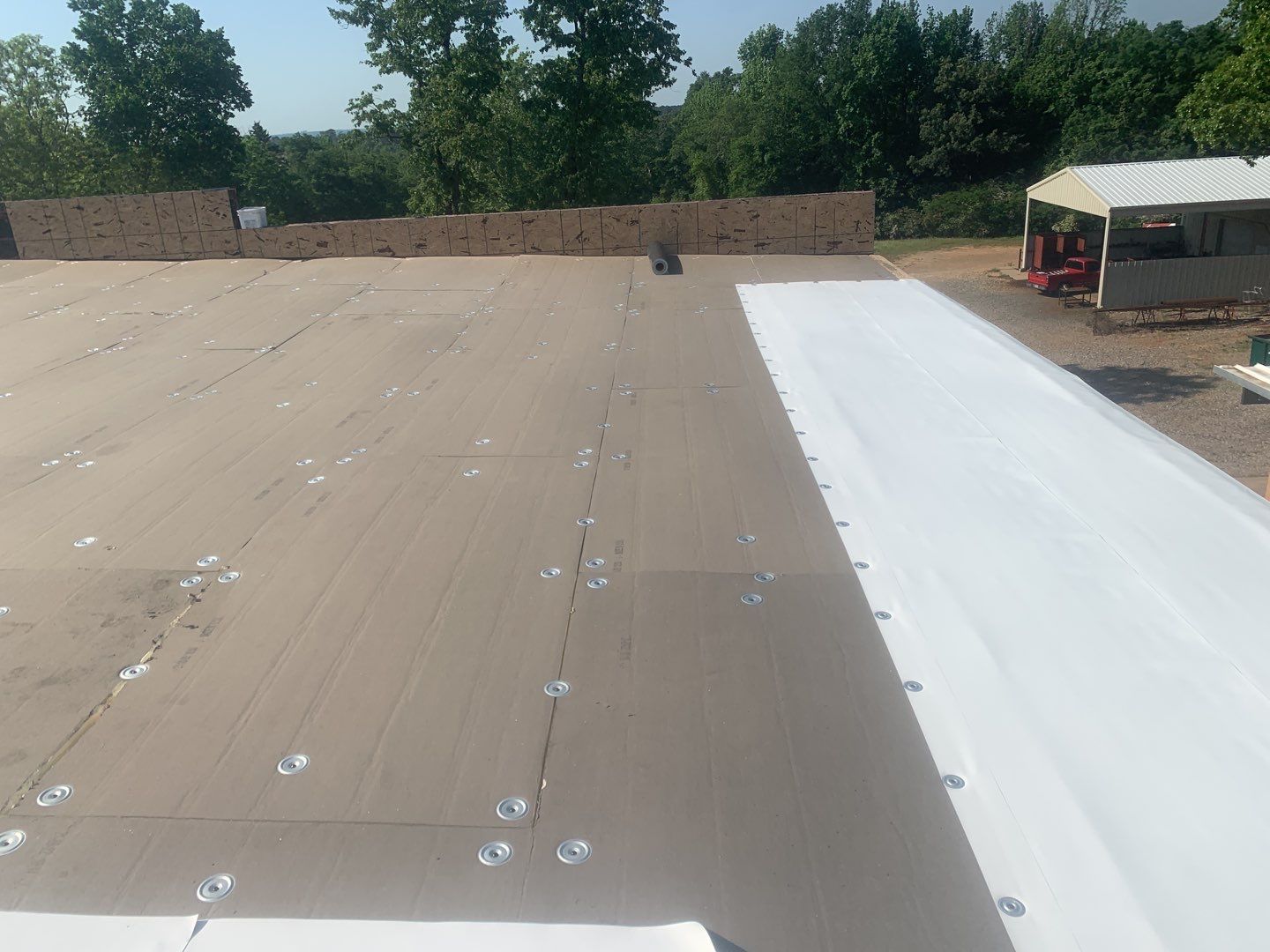 Commercial Roofing Installation using 50 mil PVC by Hostetler Roofing