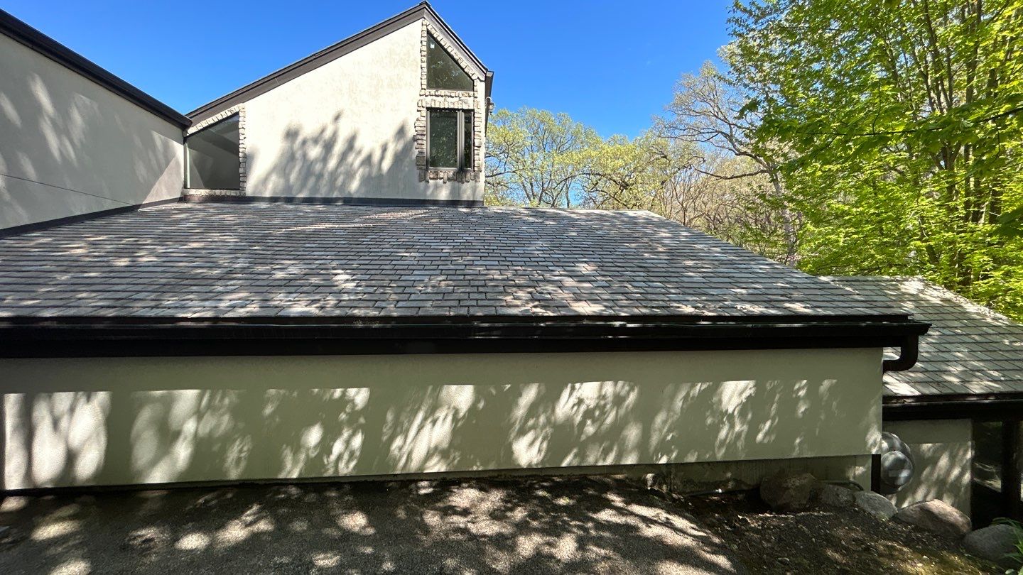 natural stone using Algaecide, soft wash soap by Northern Power Washing LLC.