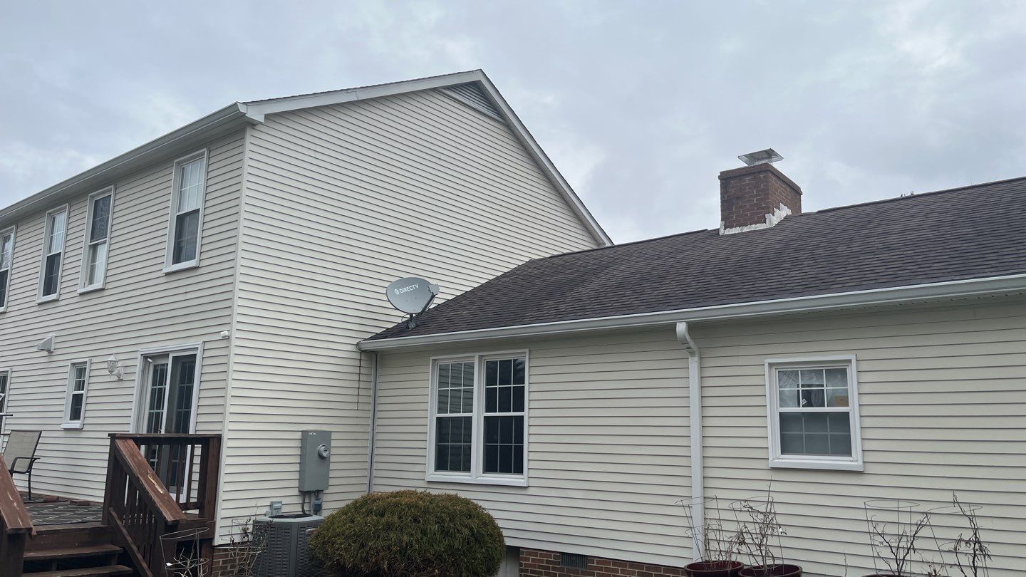 Residential Roofing Installation using Atlas Pinnacle Pristine Black Architectural Shingles by Frederick Roof Repair