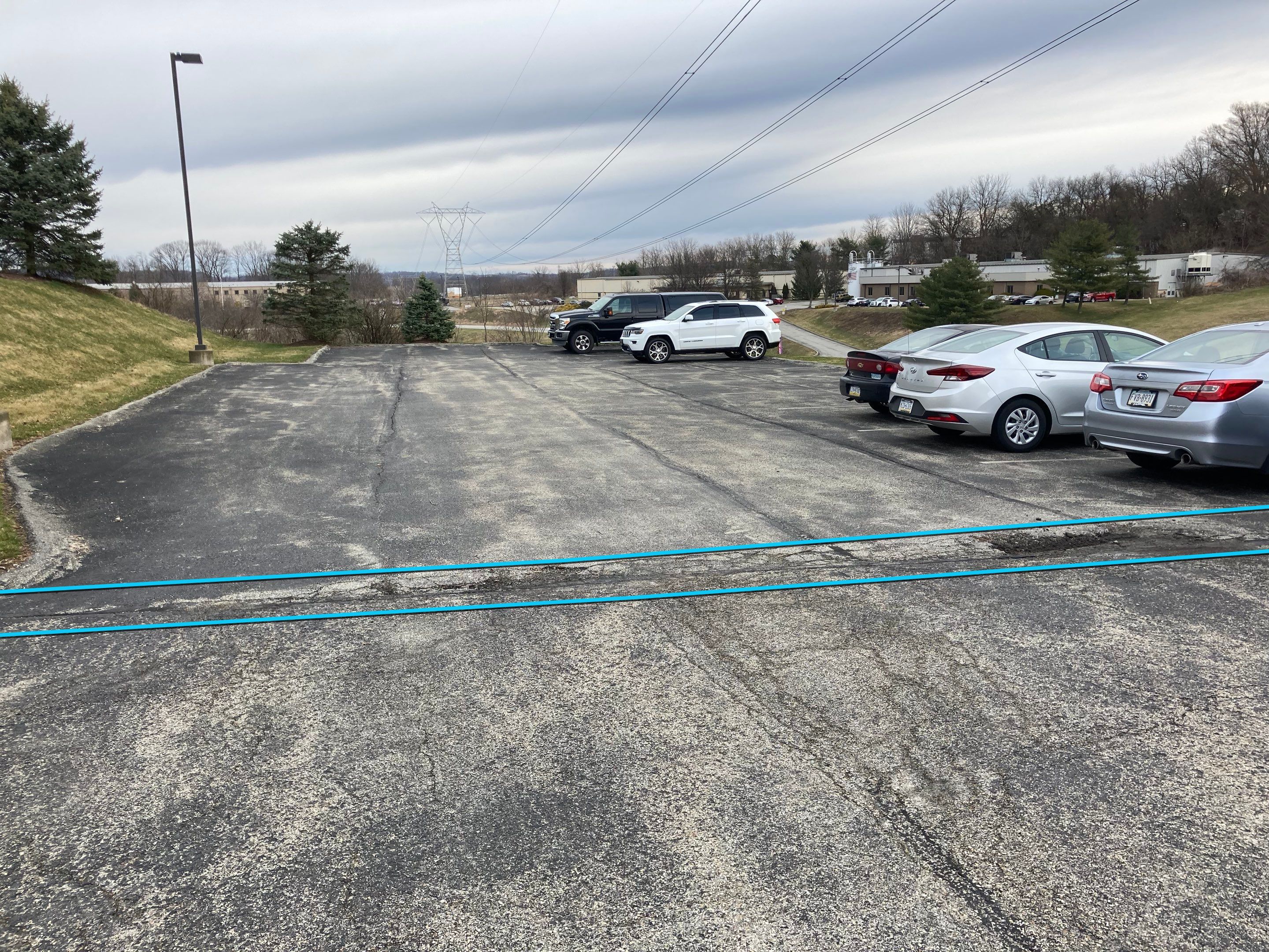 Asphalt Resurface Commercial Park Lot using asphalt by Brant's Asphalt