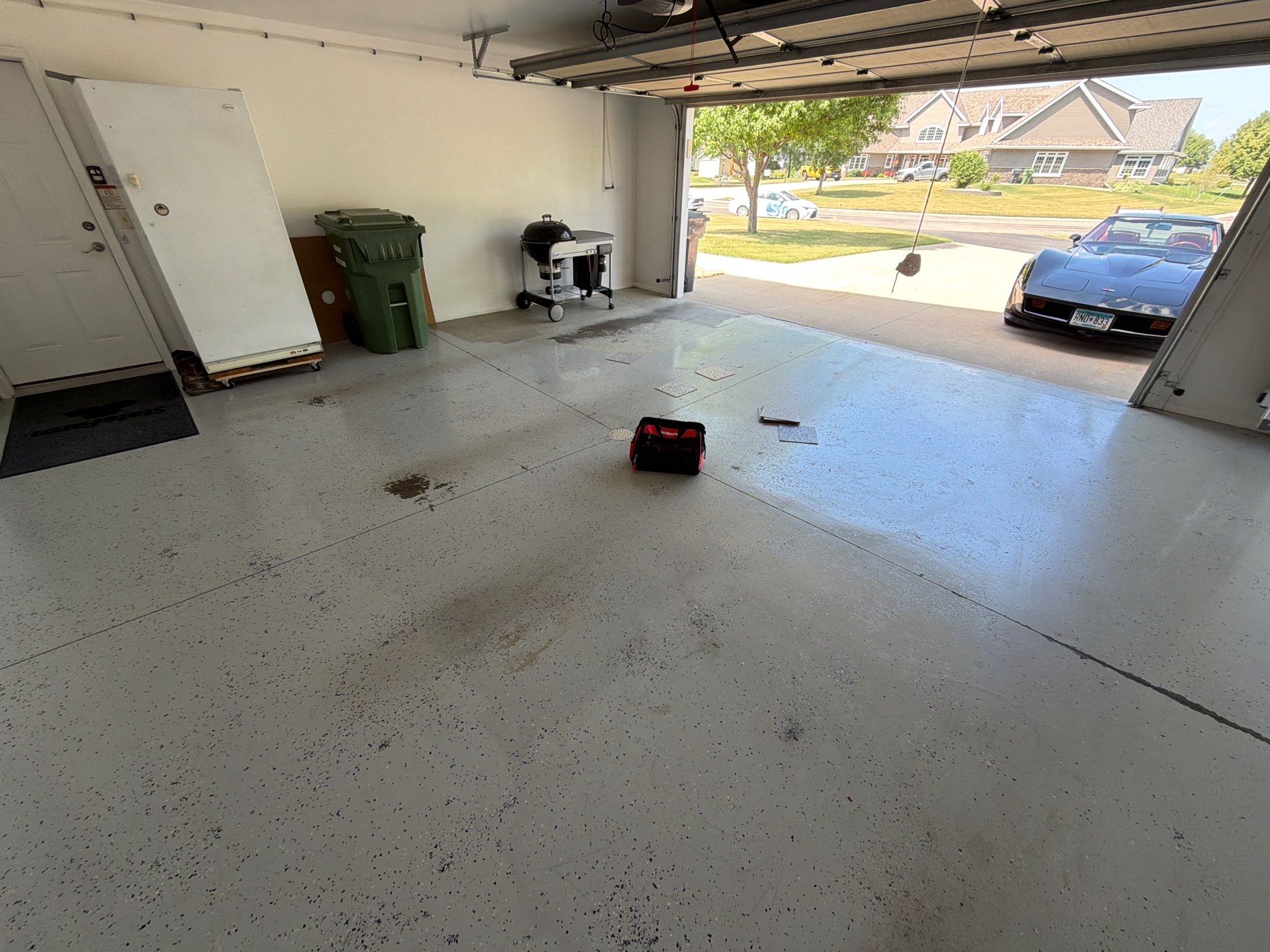 Coyote Flake Garage Floor Coating in Worthington, Minnesota by Select Painting, Coatings & Garage Cabinets
