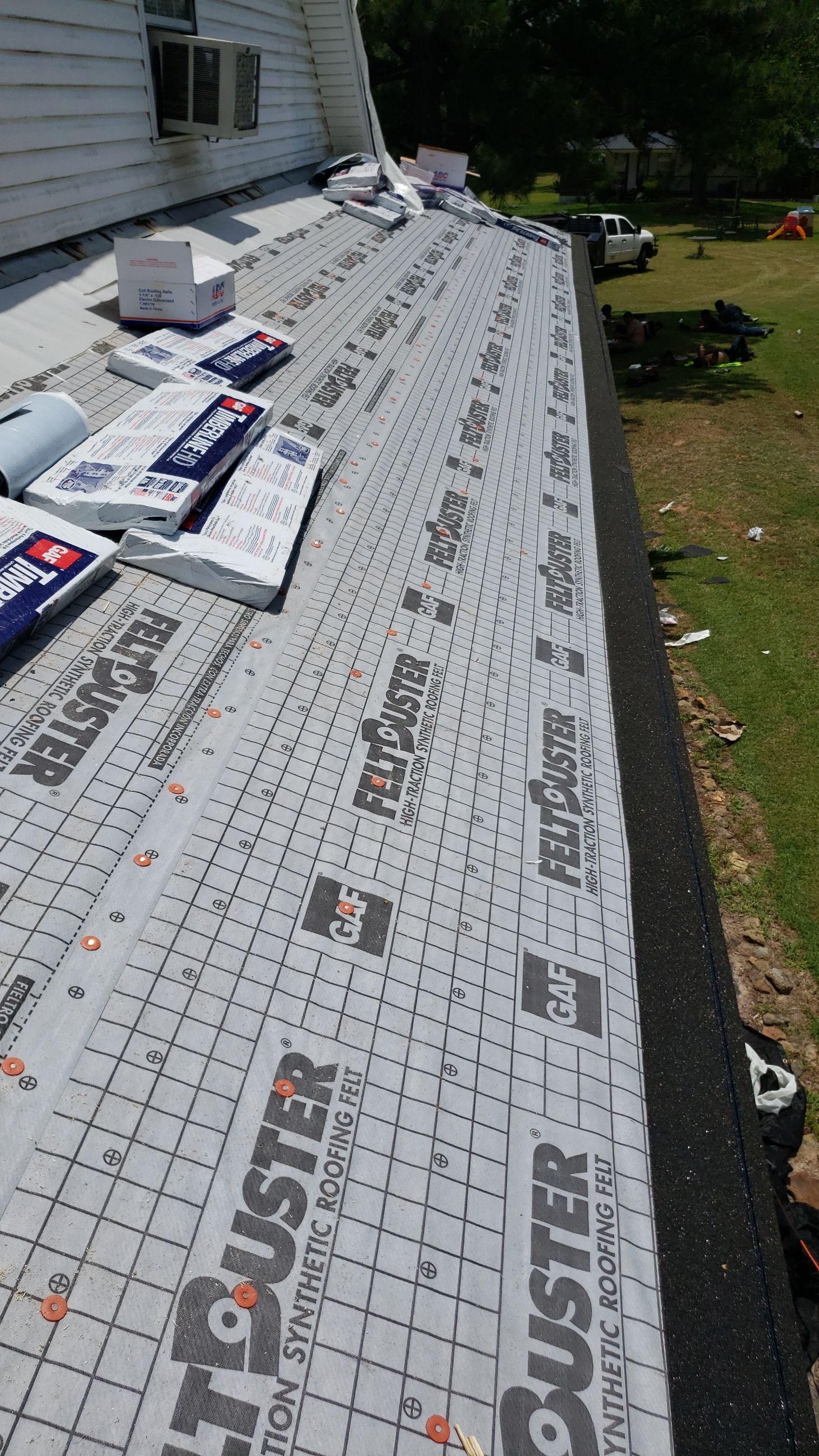 Residential Roofing Installation using Roof Replacement by American Roofing & Construction LLC