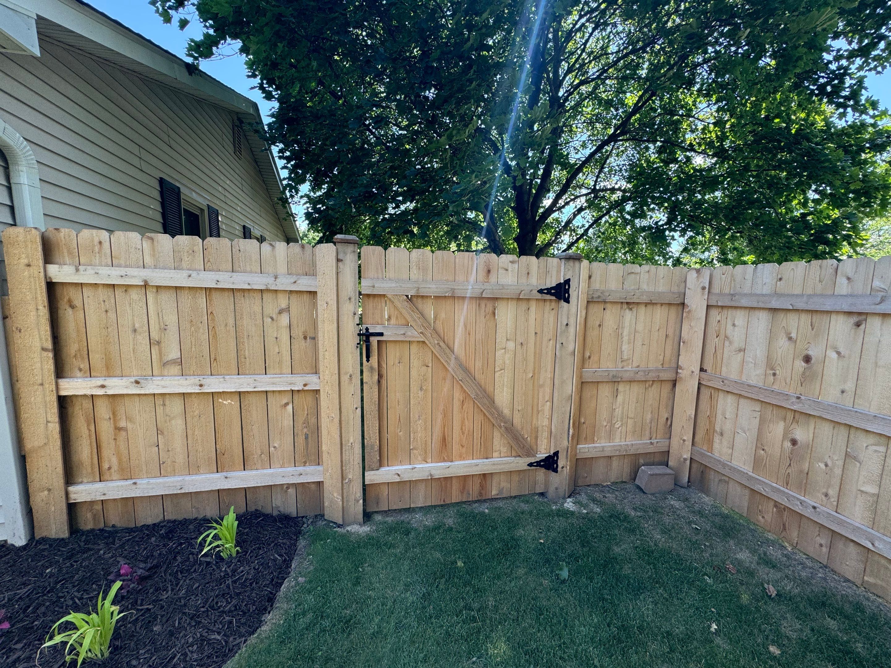 Fence Treatment by Two Brothers Residential Maintenance