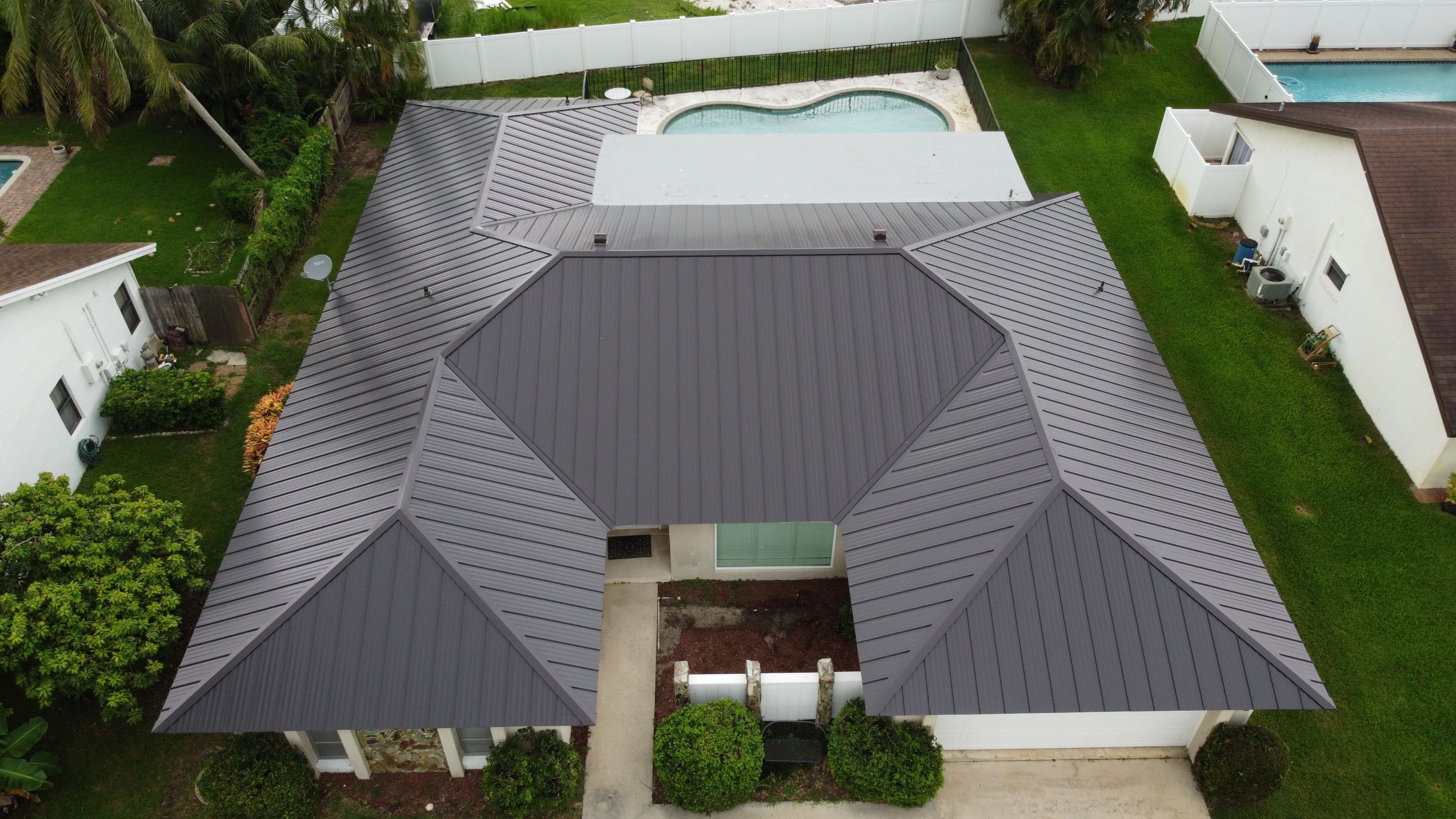 Residential Roofing Installation using 1" Nail strip metal roof by BLUES BROTHERS CONSTRUCTION CORP