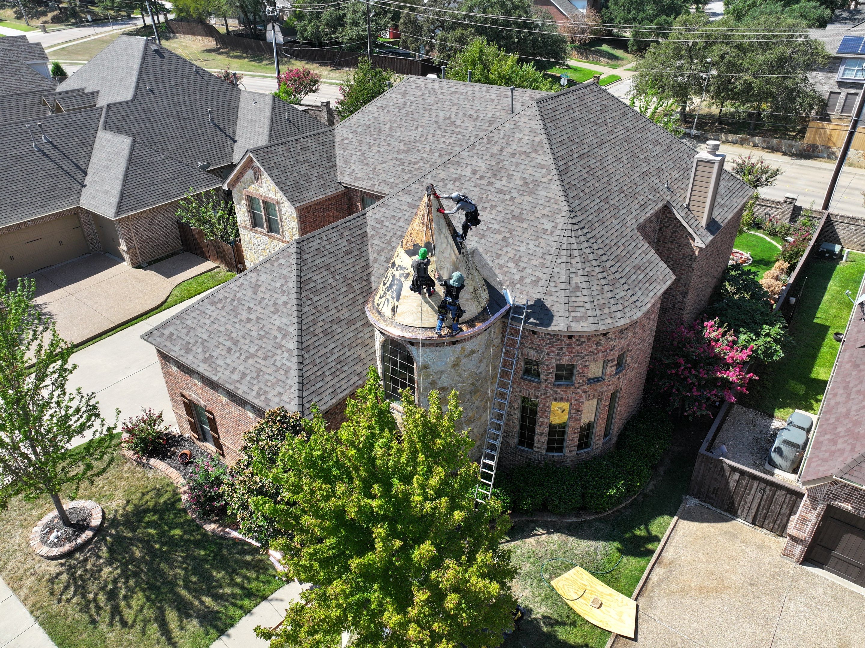 Installing Custom copper turret and Malarkey Vista Class 4 shingles Hail Damage Upgrade by Becker Roofing and Exteriors