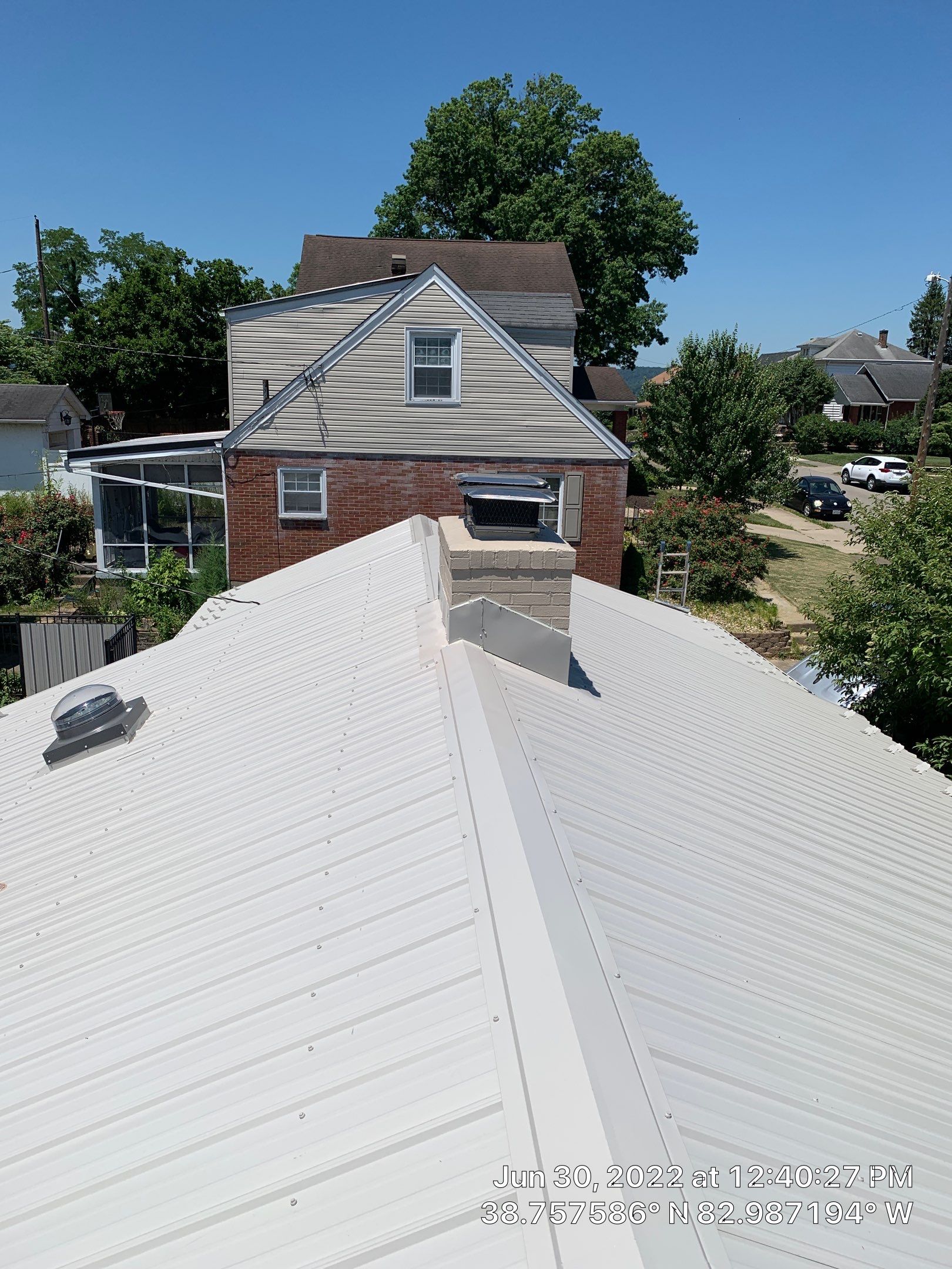 Metal Roofing, Skylights, Porch Build by Secure Construction Company Inc
